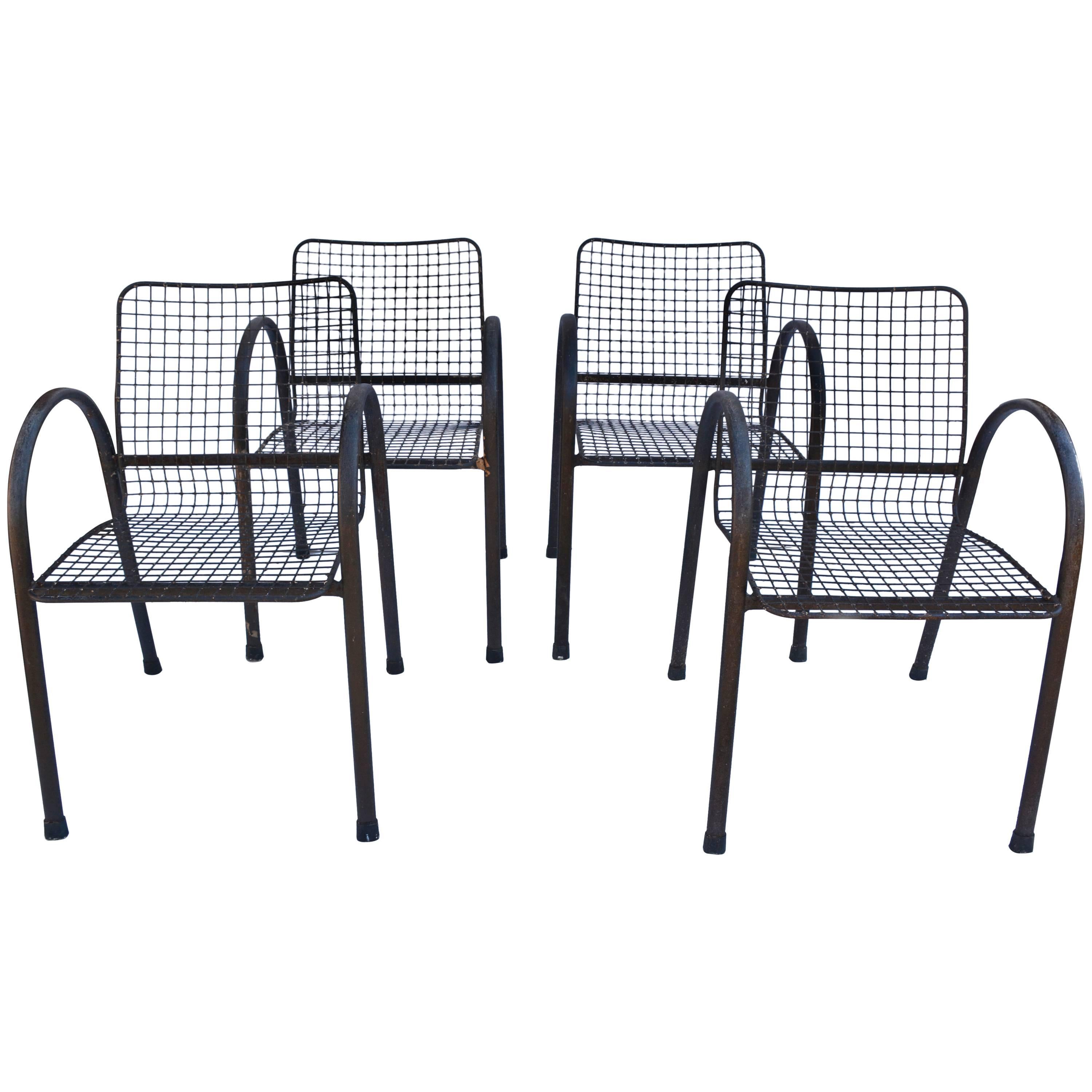 Four Patio Wrought Iron Mesh Armchairs