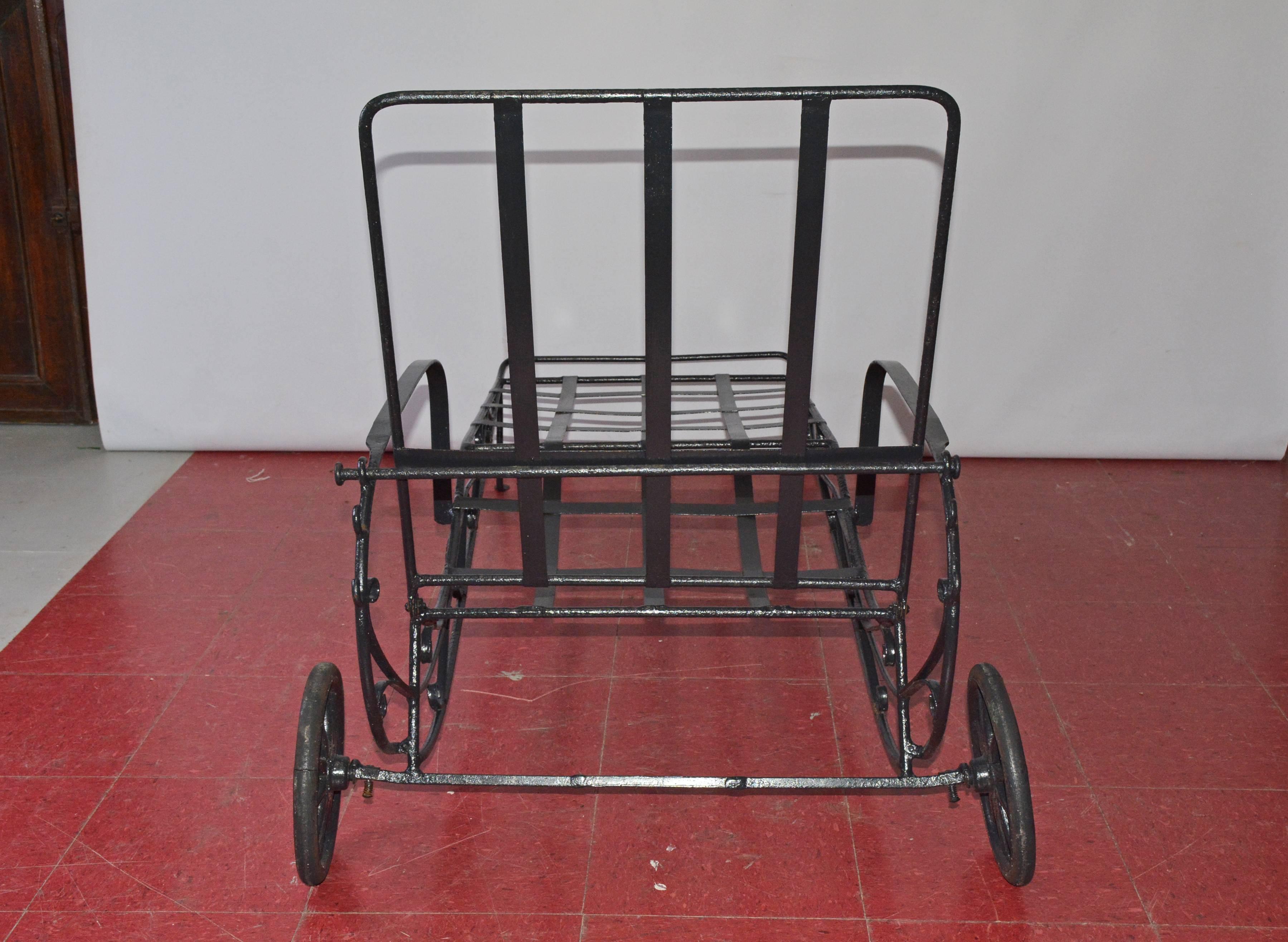 vintage metal chaise lounge with wheels