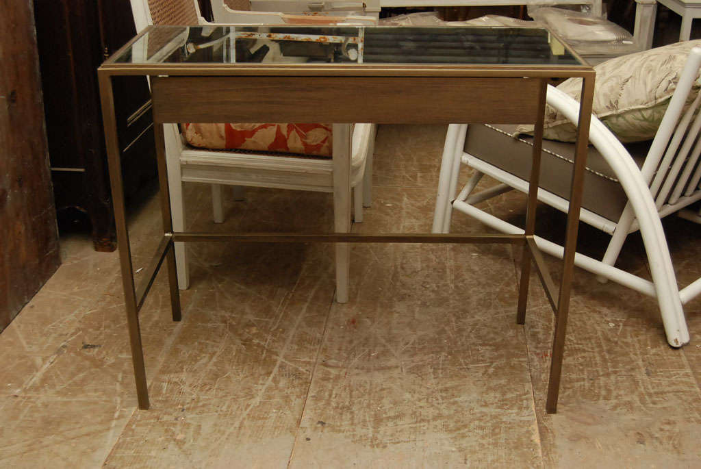 Versatile modern and traditional styled piece that can be used as end table, vanity or desk. Table has distressed mirrored top and drawer. Matching vanity stool available.  Can work well in neoclassical or most styles.  Custom made by us.  Size and