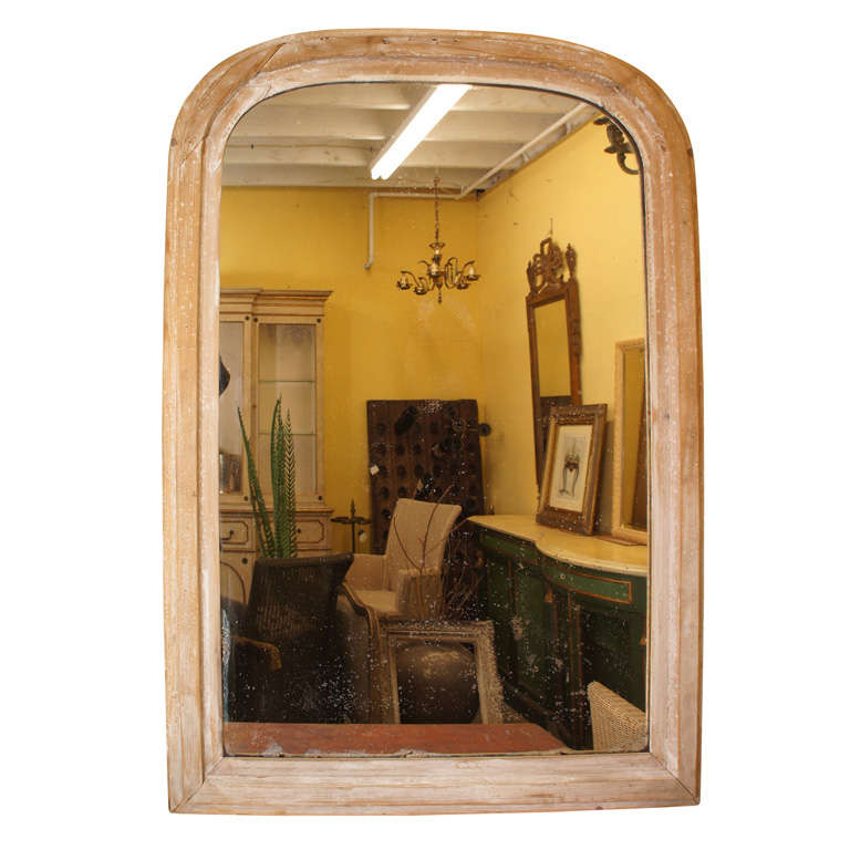 Oversize antique French Louis Philippe mirror with gesso remnants and original mirror. The frame is in it's original raw wood state with great character and patina. Lends itself to suit most decor including Swedish Gustavian, Modern, country or