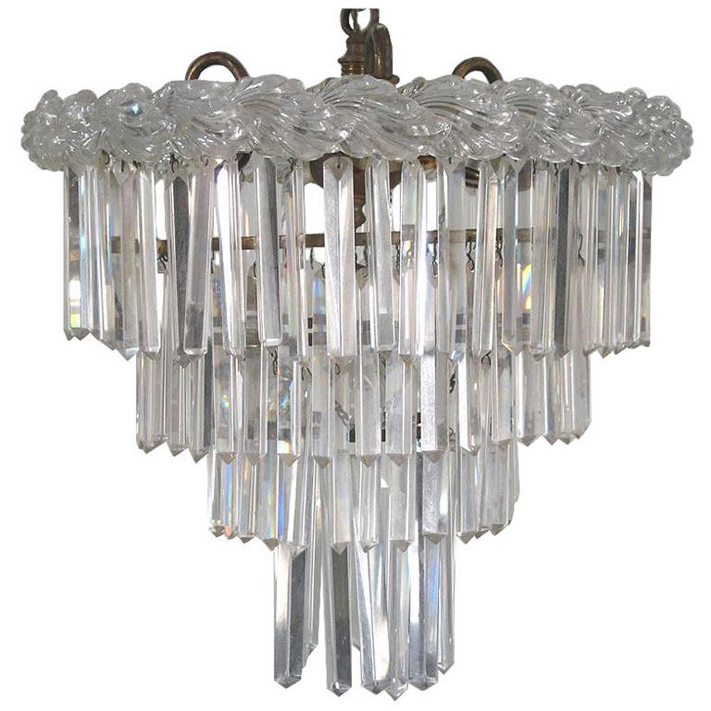 Lampadario a quattro piani in vetro tagliato e pressato