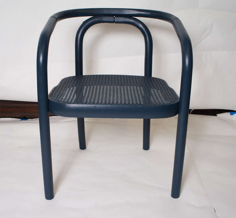 Midcentury dark blue, navy painted armchairs.

Keywords: dining chairs.