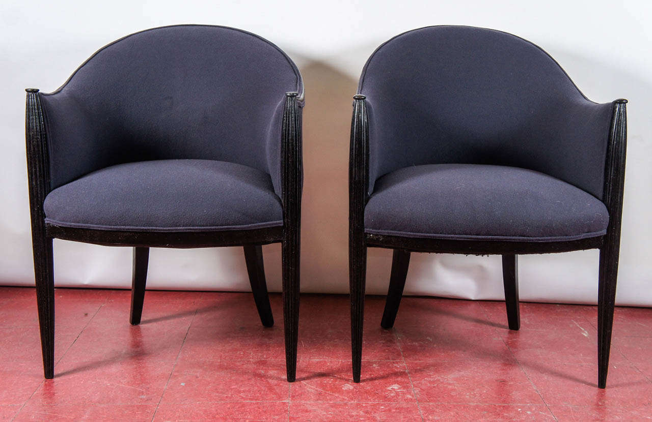 These French Art Deco chairs are made in the style of E, J. Ruhlmann or Paul Follot. There are six chairs available all together but are sold in pairs. These are perfect for comfortable seating without taking up a lot of room. Tapered and fluted