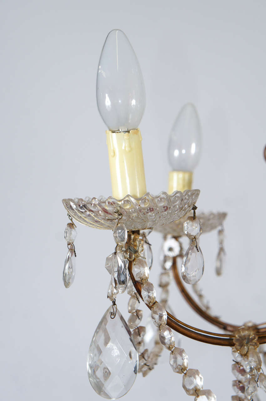 Kristall- und vergoldeter 12-Licht-Kronleuchter (19. Jahrhundert)