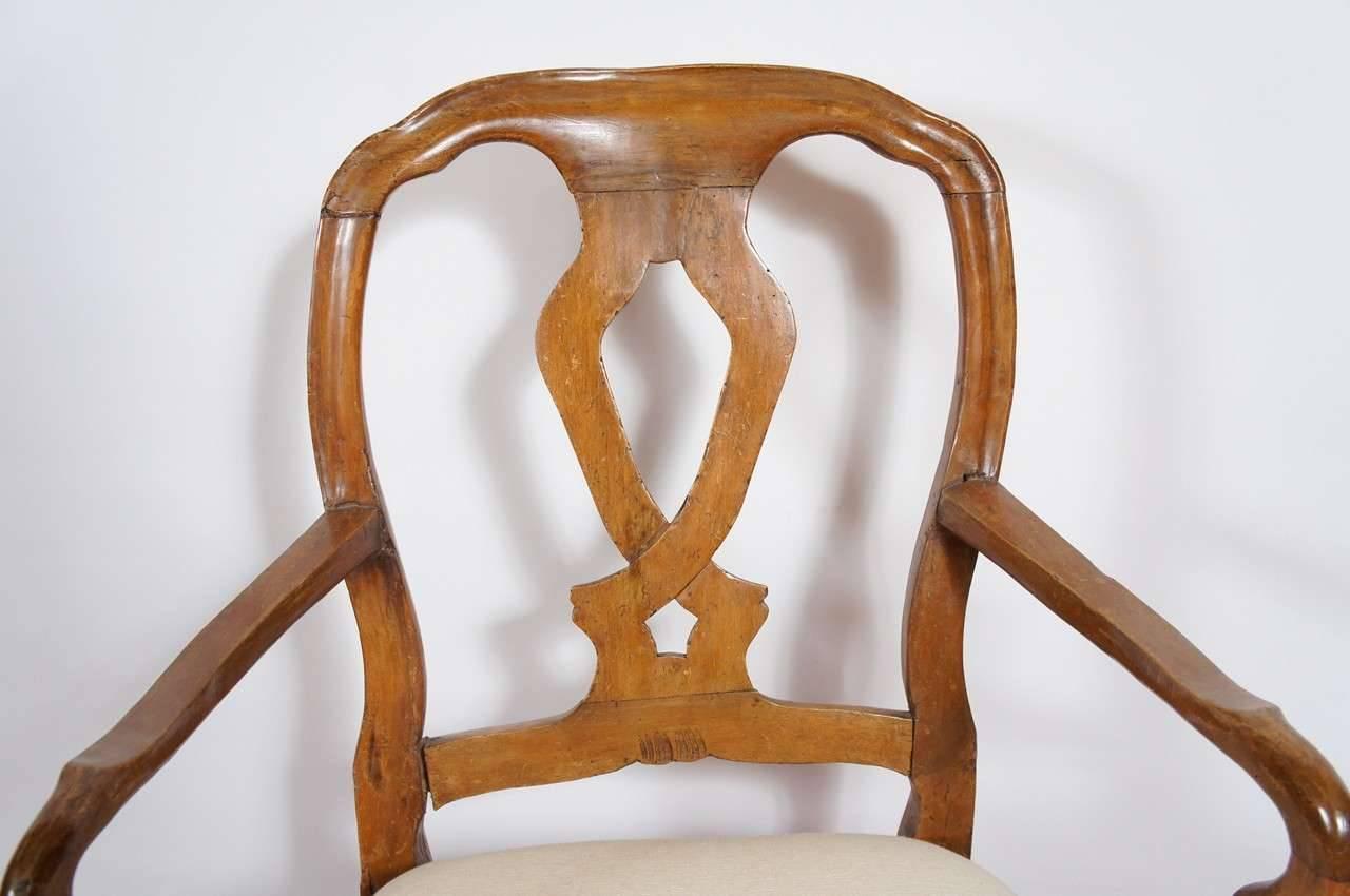 Pair of 19th century hand-carved Italian armchairs in the country style. Solidly restored with no loose joints. Cabriole legs, wonderful patina. Beautifully upholstered. Great occasional, desk, dining chairs.
Can also be used in French Louis XV