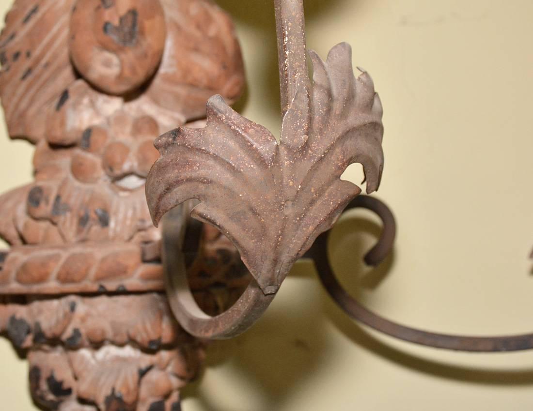 Italian Hand-Carved Wood and Iron Sconce In Distressed Condition For Sale In Sheffield, MA
