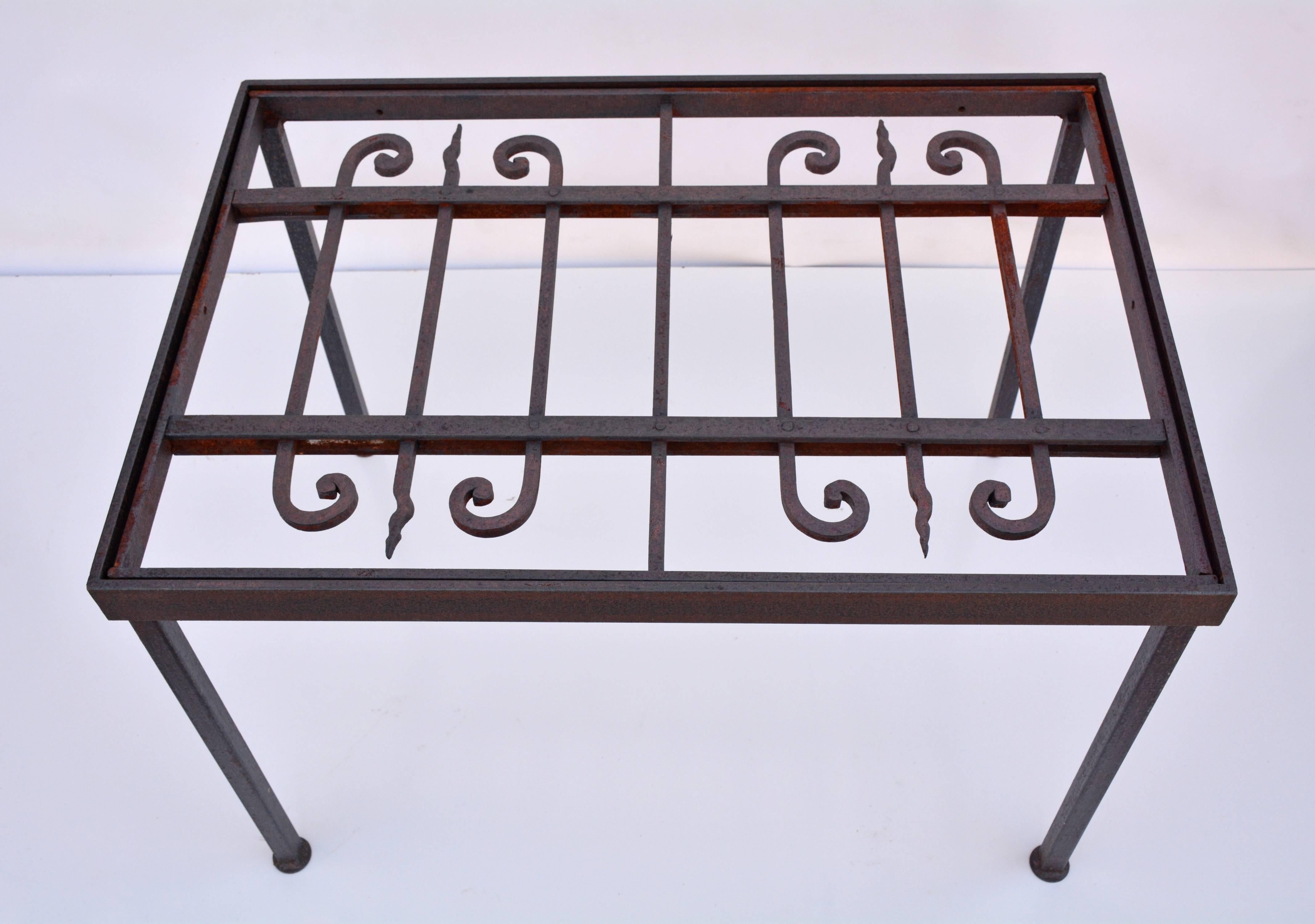 Framed patterned grillwork top sits down within the table frame. A required glass top can then be set on top of the grillwork. Can be used as side table, end table or coffee table.