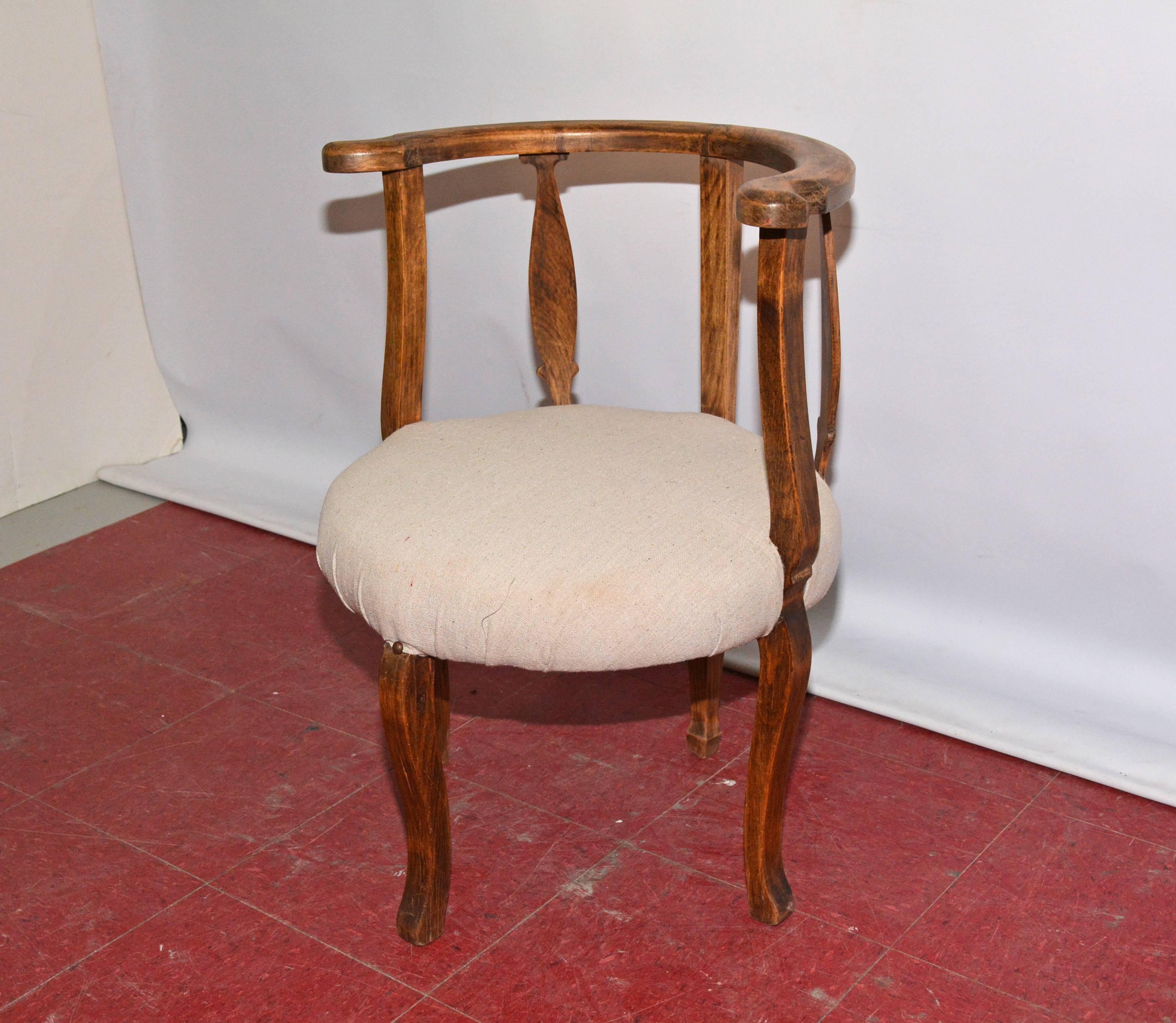 The chair is made of hardwood and has simple cabriole legs, the seat has new beige linen upholstery. Great in a bedroom or used as a vanity table chair. Arm: 27.50