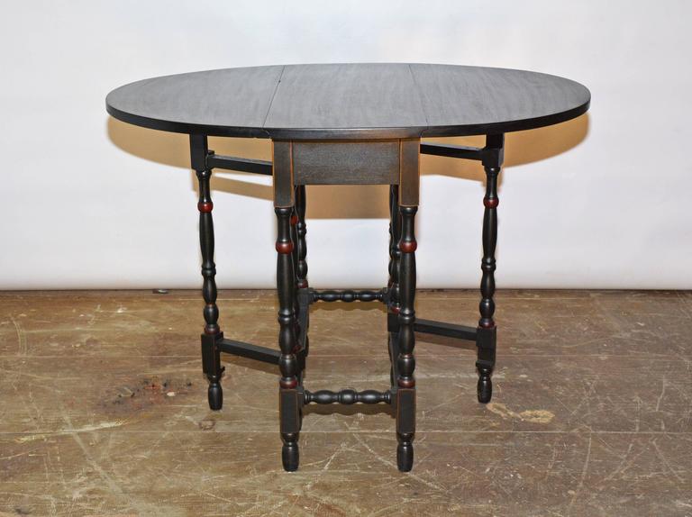 Oval Gate Leg Table At 1stdibs The Oval Gate Leg Side Table Stained Black With Red Trimmed Legs Has
