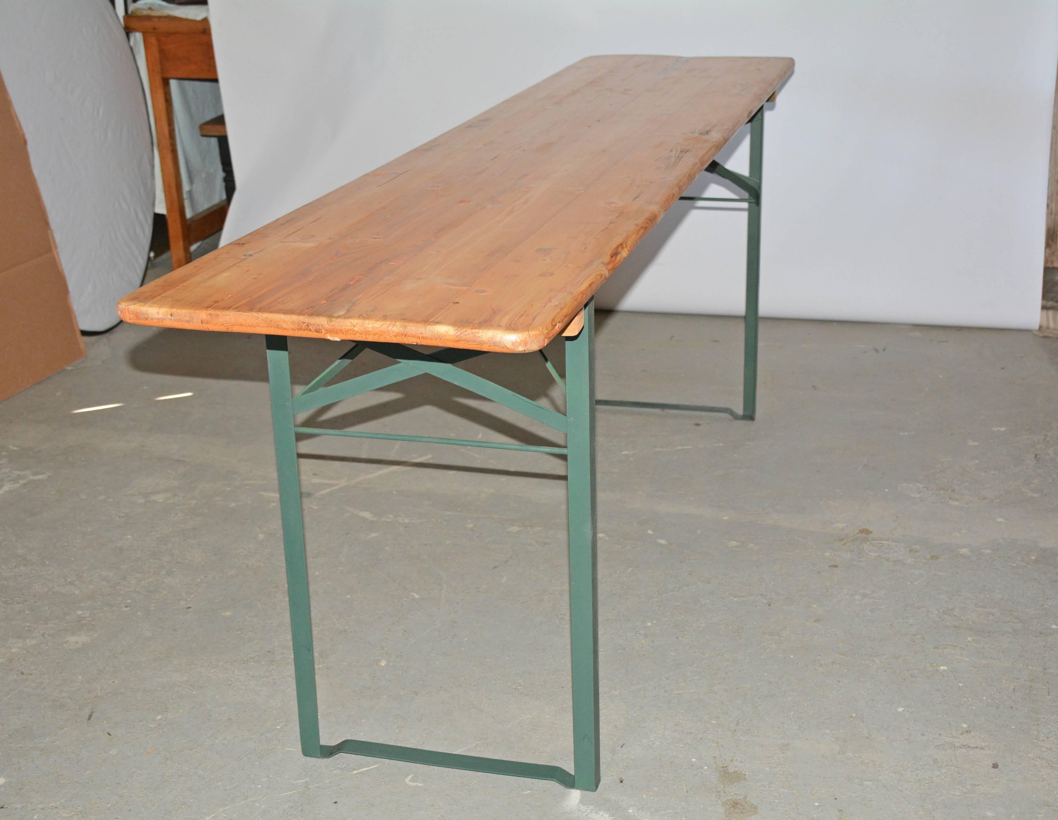 Authentic German beer hall folding table. Pair of matching folding benches available. Bench dimensions: 11