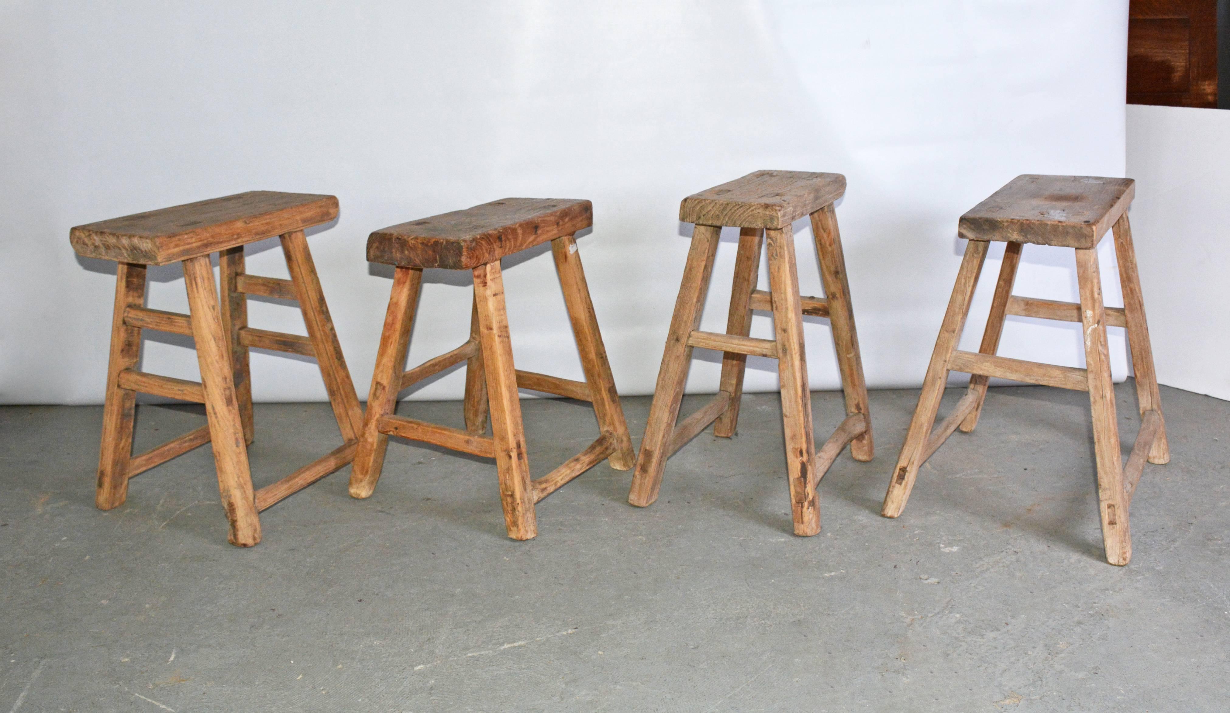 The four rustic Chinese teak stools are crafted with pegged legs that fit into the seats and stretchers that fit into the legs for sturdy construction.
Can be used for side table, end table, or extra seating for dining. Great for porch or patio. 