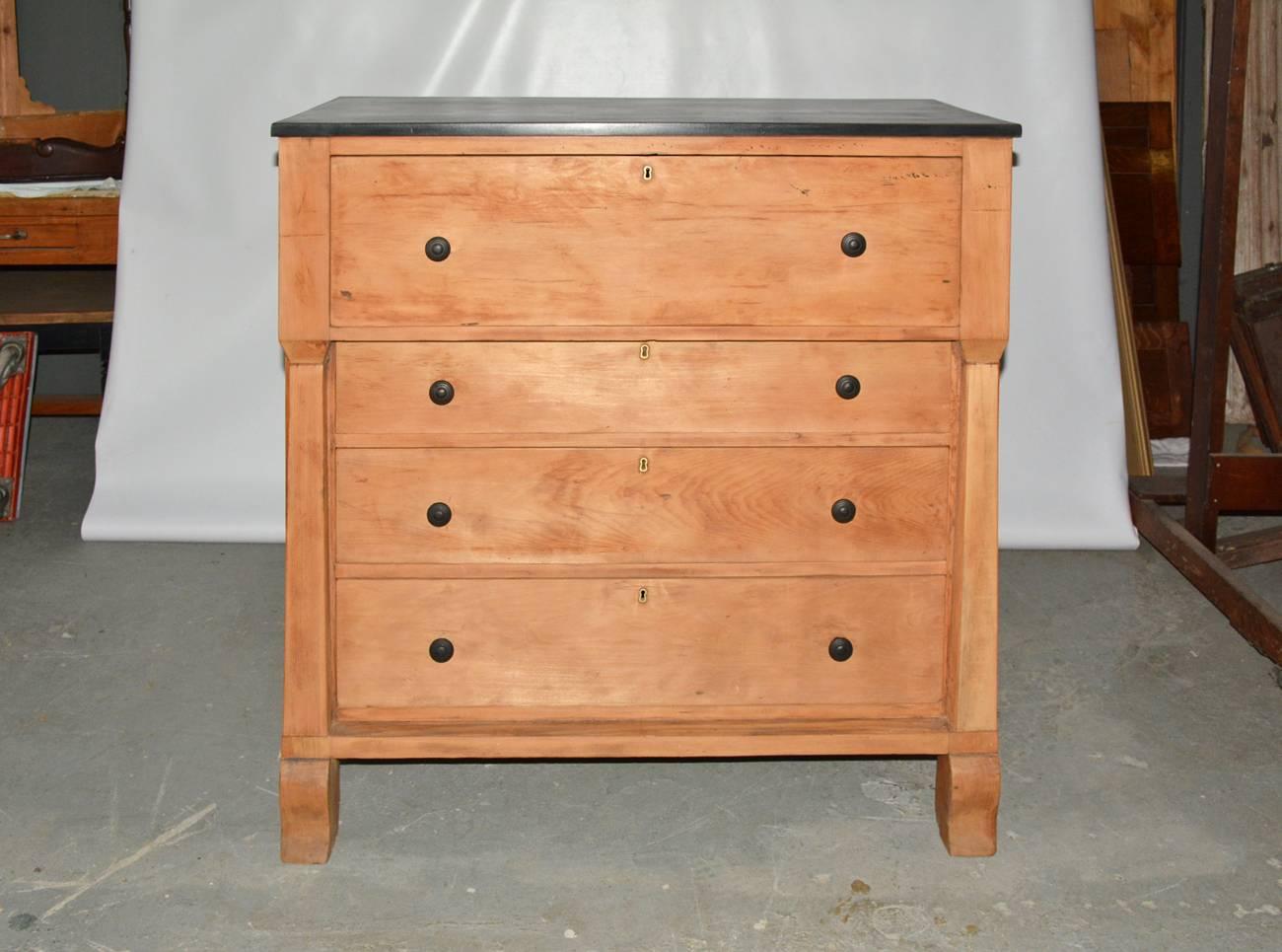 American Empire style bureau with handsome details. Four large drawers with replacement metal drawer pulls.