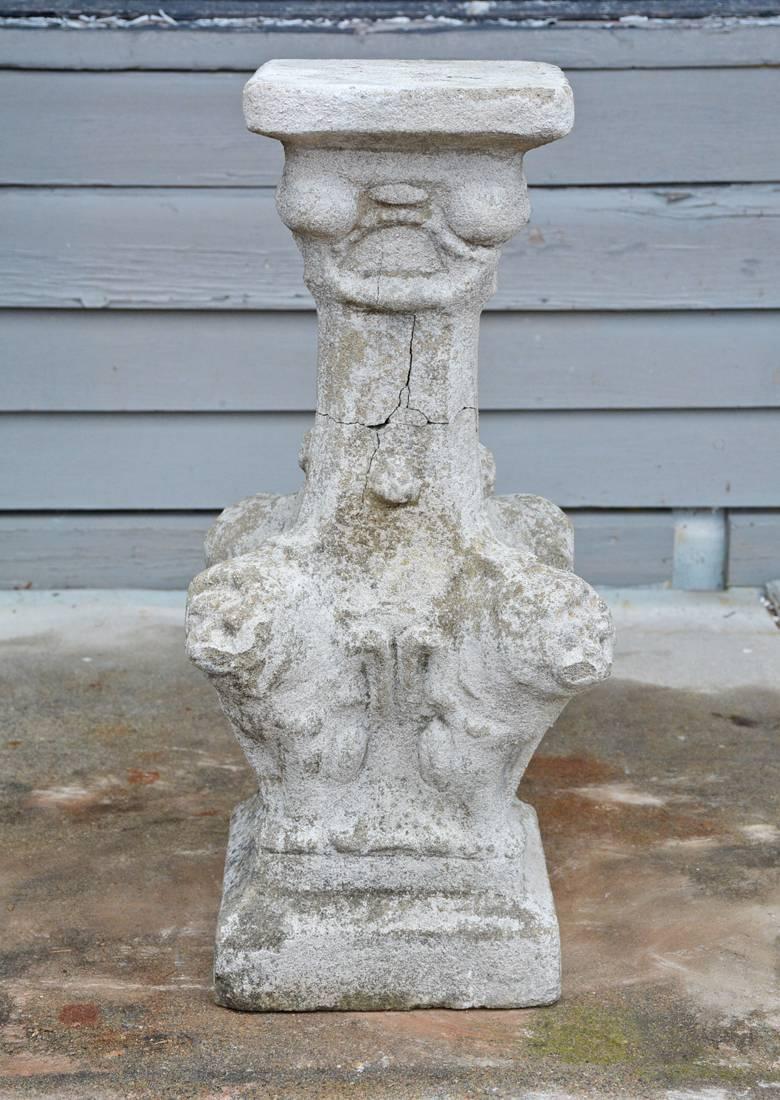 19th century English Romanesque antique stone pedestal has protruding lion mask carved on pedestal.

Base measurement: 9.25
