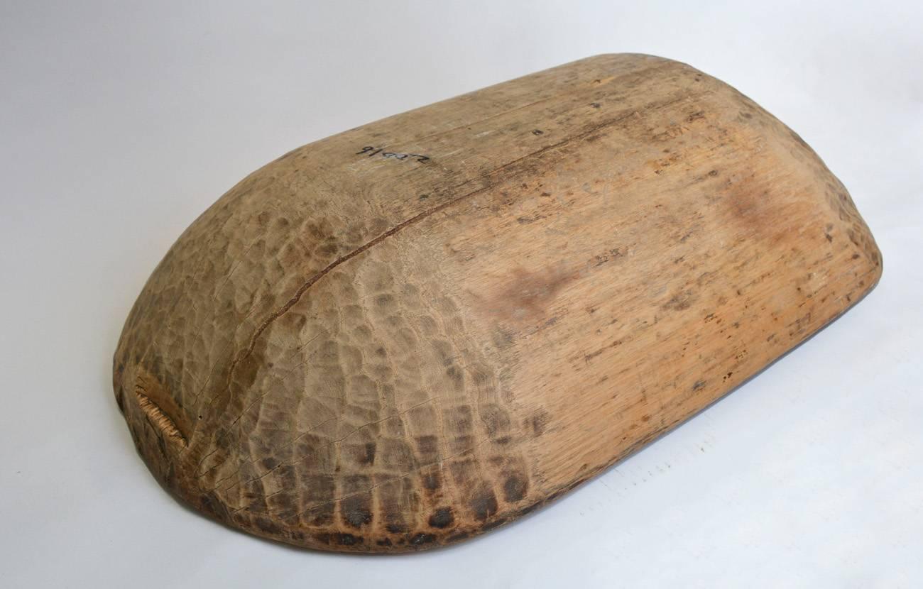 large shallow wooden bowl