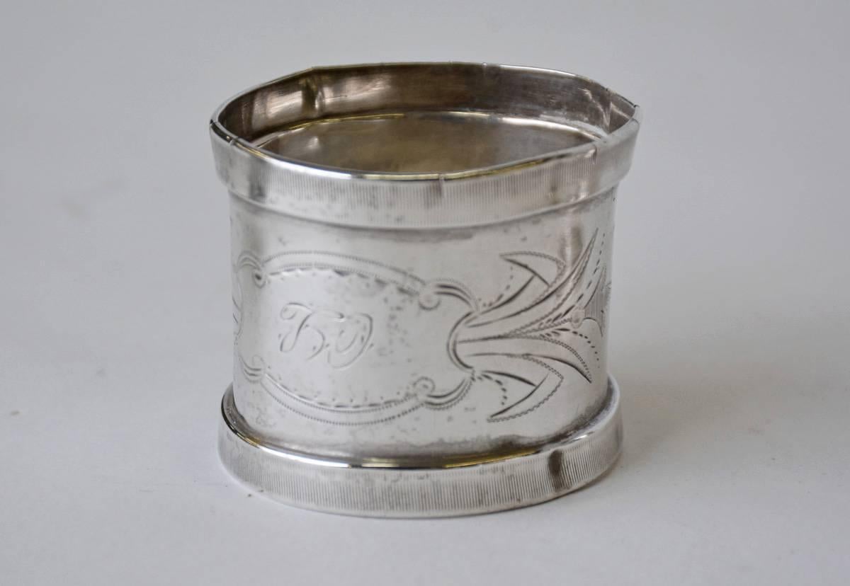Four Late Victorian, Three Sterling and One Silver Plate Napkin Rings In Fair Condition For Sale In Sheffield, MA