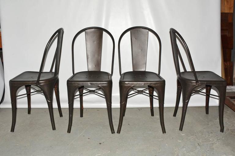 Four Tolix Style Industrial Metal Bistro Chairs For At 1stdibs French Four Tolix Style Industrial Metal Bistro Chairs For