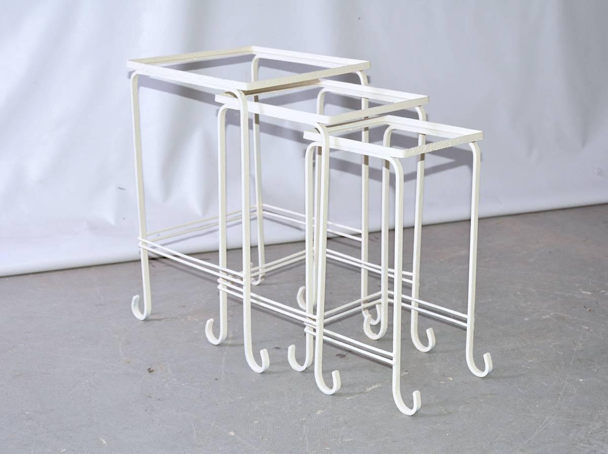 Set of three painted indoor or outdoor stacking iron side tables. Ready for glass, stone or an insert of your choice.

Measures: Medium: Depth 10.25