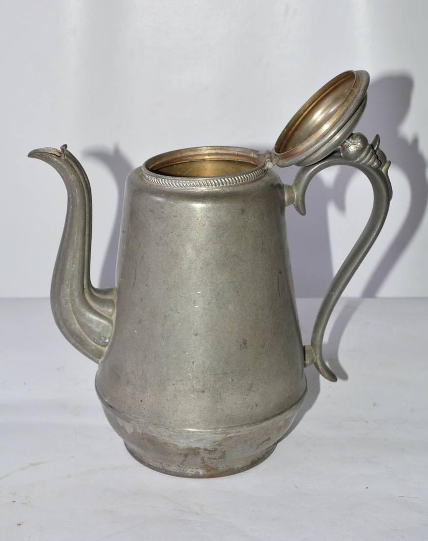 Antique English pewter coffee pot.