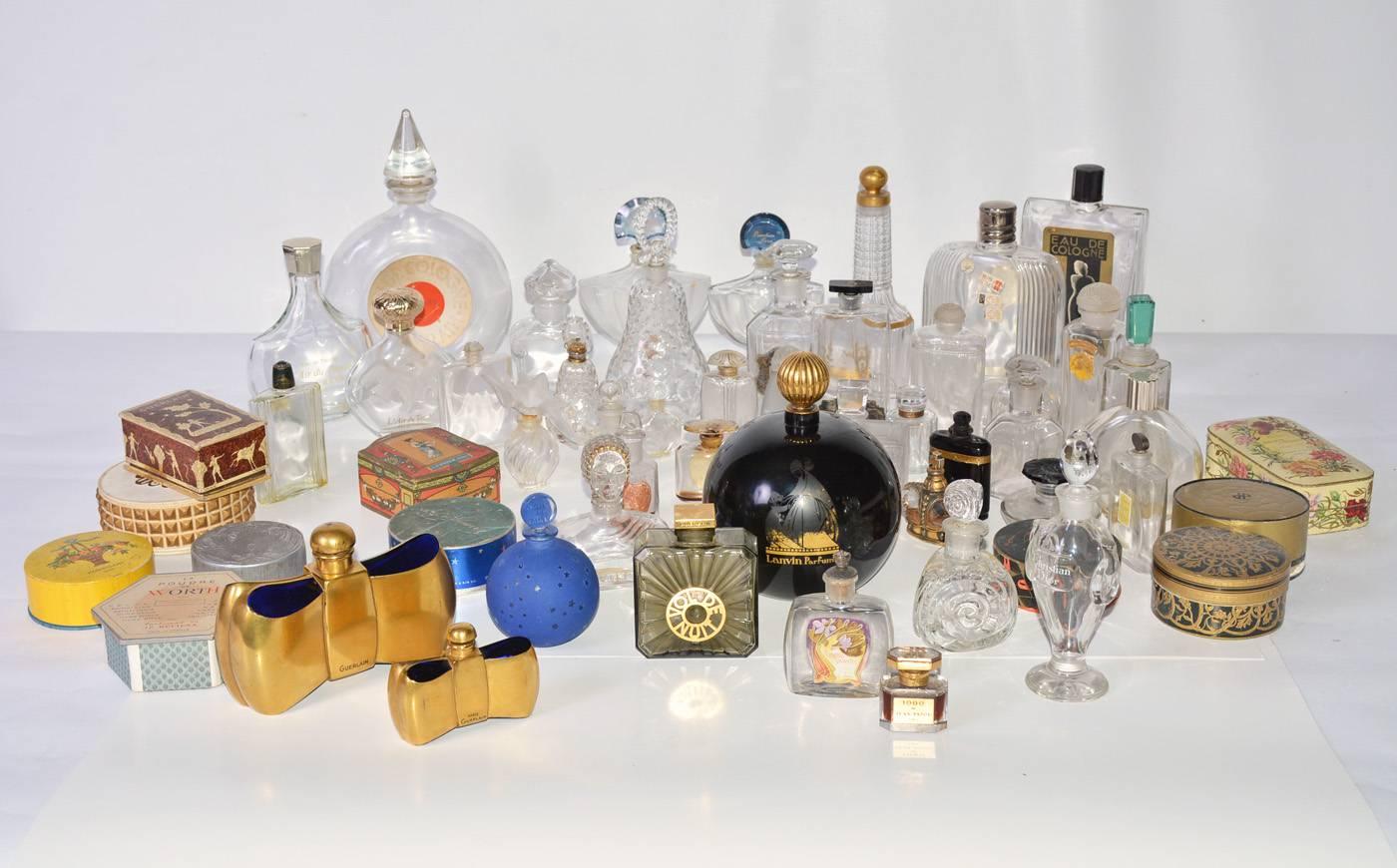 A wonderful and selective collection of vintage perfume bottles, including Guerlain and Dion with some bottles manufactured by Baccarat and Lalique.
