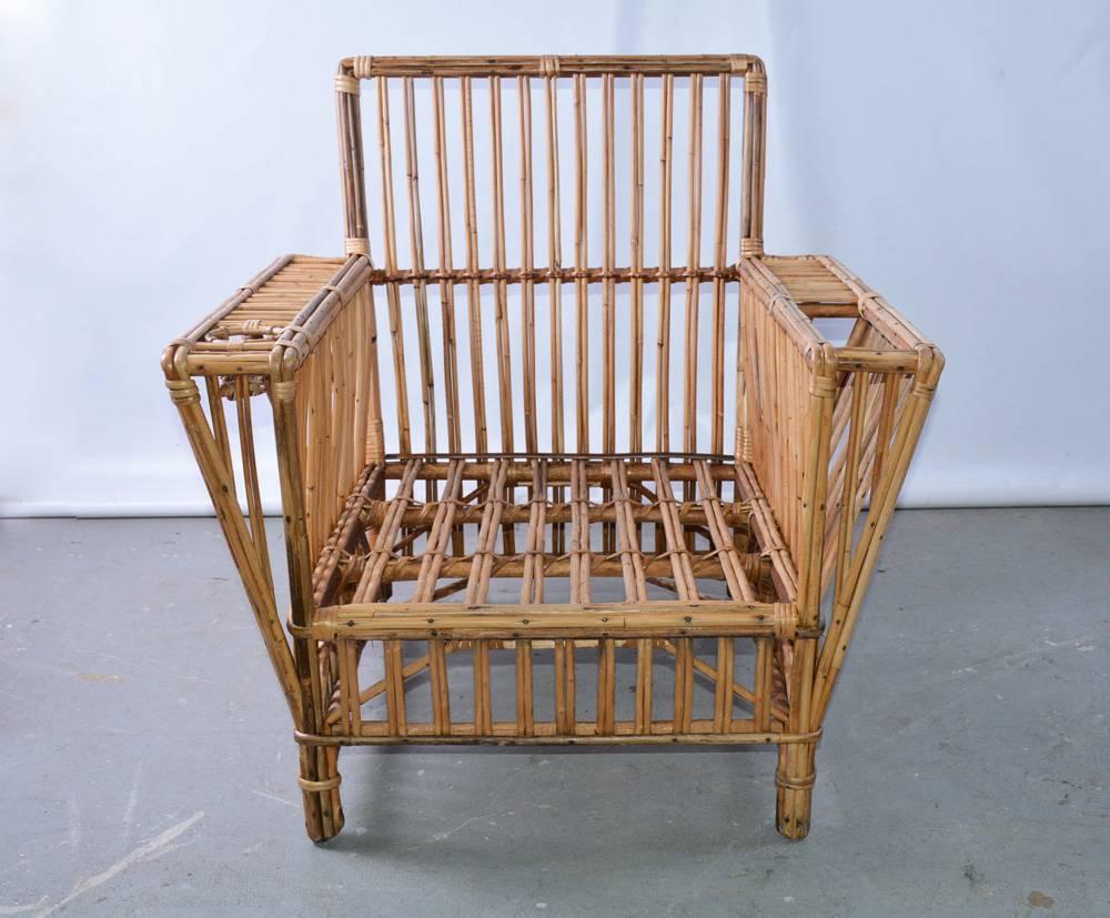 Generous in size, this rattan wicker lounging armchair has a wide and deep seat, as well as an arm pocket for reading material and cup holder.
Seat Height: 12
