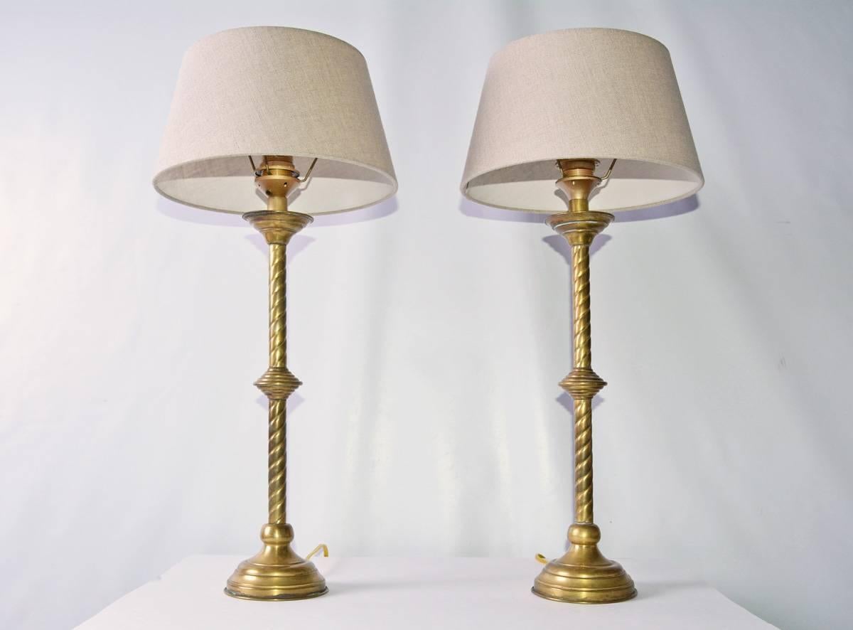 Pair of antique French Gothic Revival style brass table lamps with Belgium, linen shades. Great original condition with patina.
Measures: Height from bottom to top of shade 26