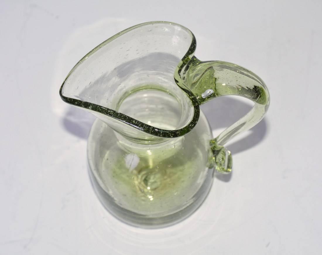 vintage hand blown green glass pitcher