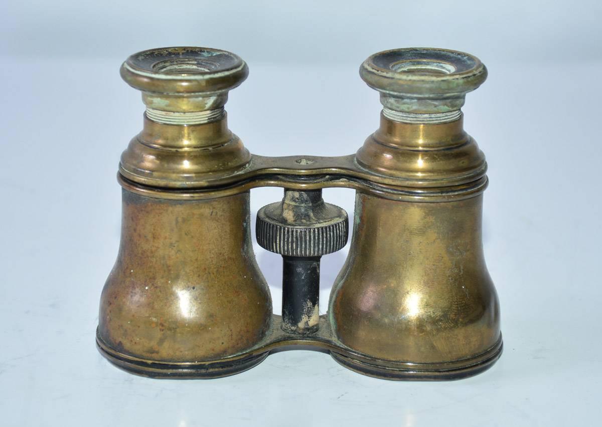 Antique French Verres opera glasses in metal casing. Can make a beautiful table top sculptural decorative item or use for its original purpose.