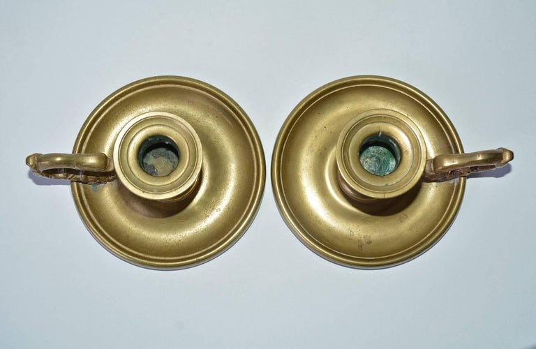 Hand-Crafted Pair of Antique Brass Candleholders with Dolphin Handles For Sale