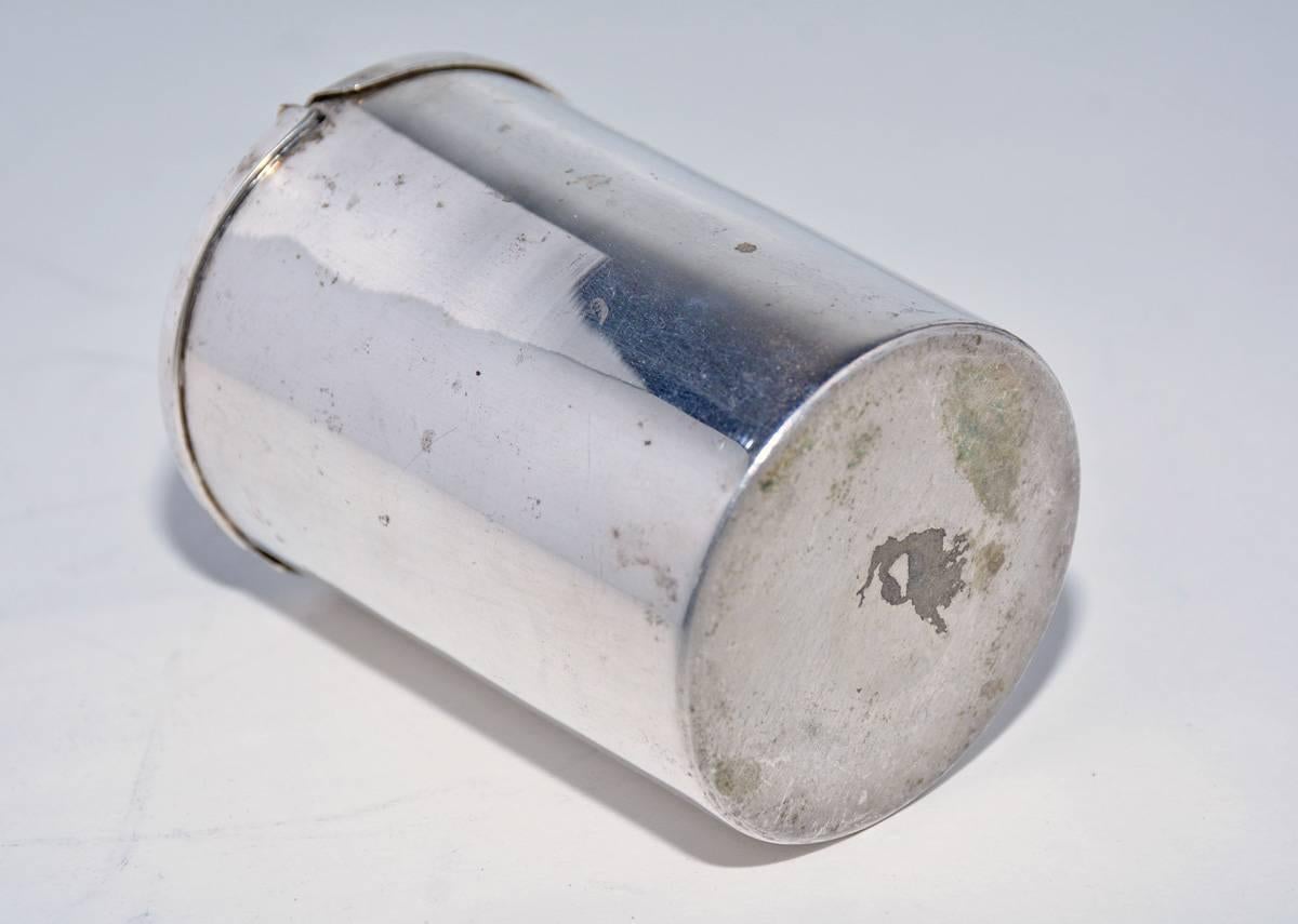 what are the small silver canisters