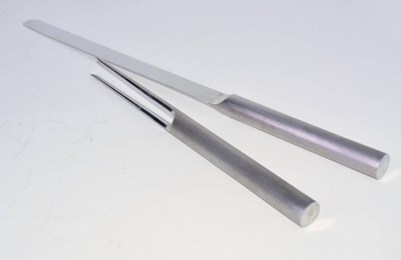 Ein wunderschönes Messer- und Gabelset aus rostfreiem Stahl von Cini & Nils, OPI Milano in Originalverpackung.
Maße: Zweites Stück: D 0,75
