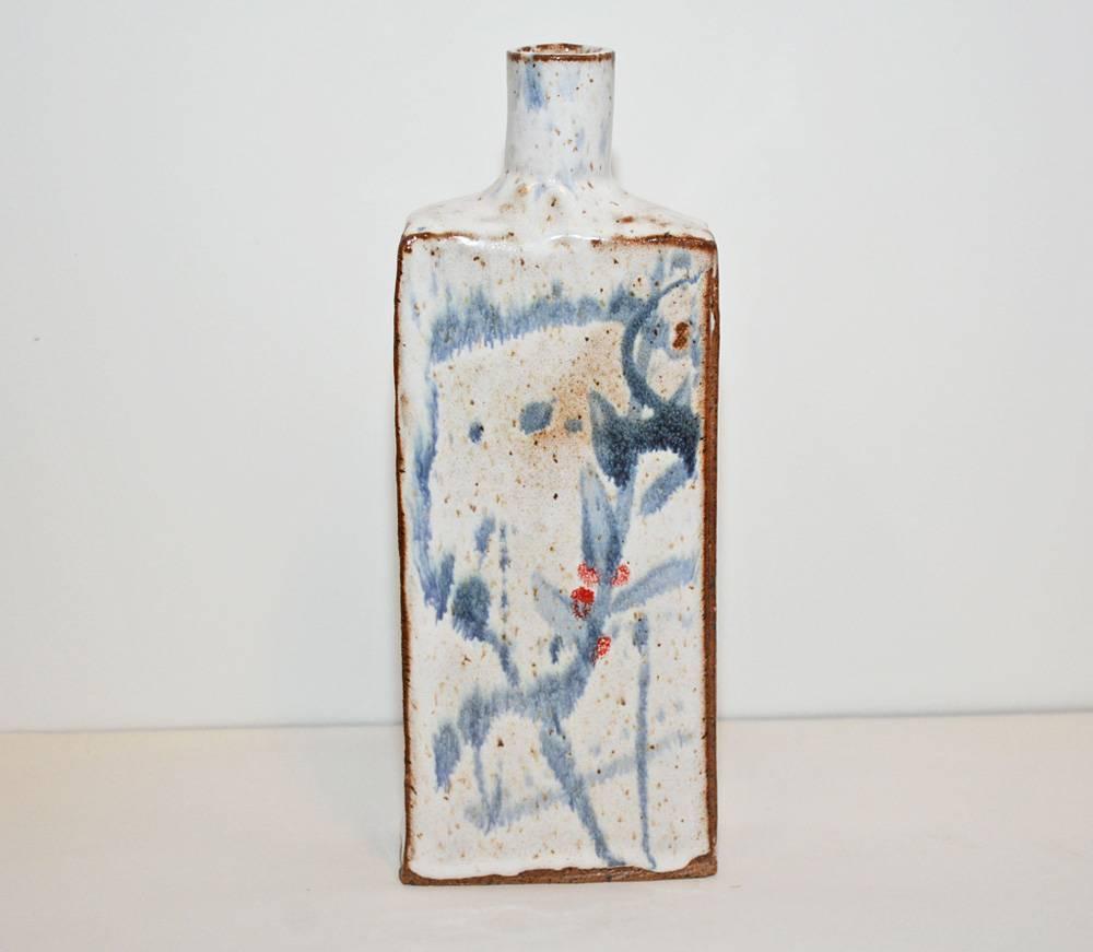 Classic low-fire stoneware bottle with white glaze and blue decoration. Can be used as vase, sake vessel or simply decoration.