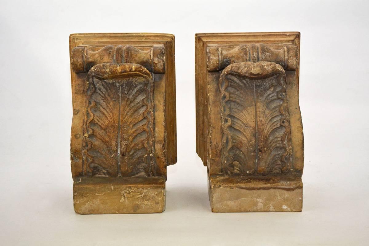 The pair of 19th century marble corbels classically inspired are designed with detailed acanthus leaves and scrolled volutes. Great as book ends or add grace and depth to a well designed space.