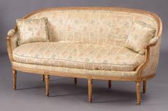 Canapé en corbeille en bois doré Louis XVI par Claude I Sené