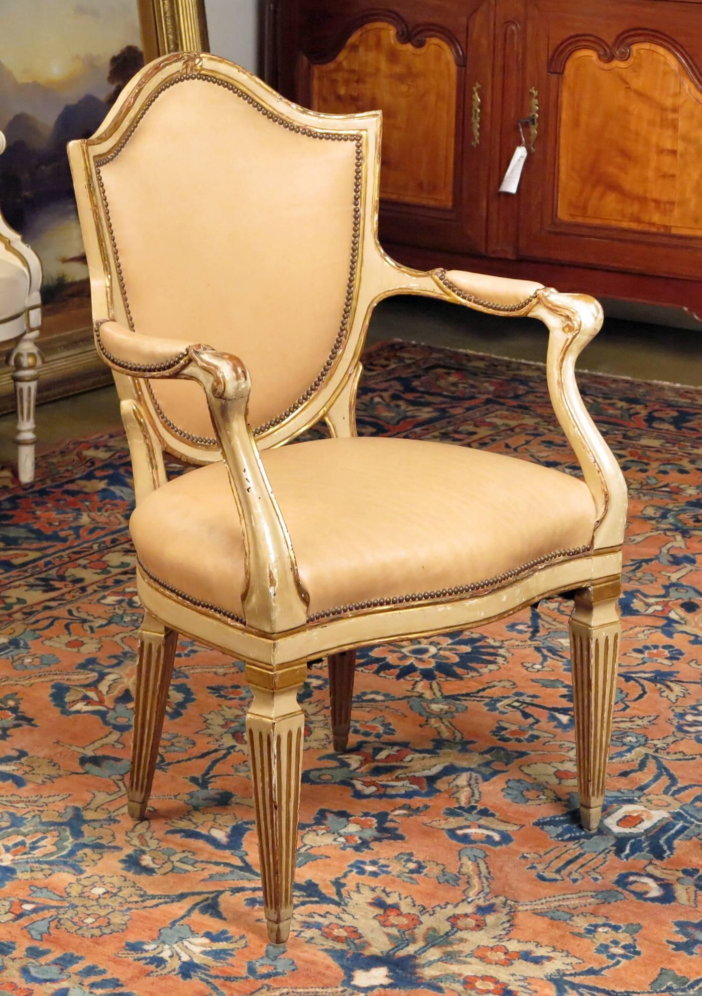 A Set of Four North Italian Neoclassic
Cream Painted & Parcel Gilt Armchairs
Late 18th Century

Upholstered in cream leather

Height 39 in.  Width 24 in.  Depth 19 in.

Provenance:
Property of a West Coast Collector
Le Trianon Fine Art &