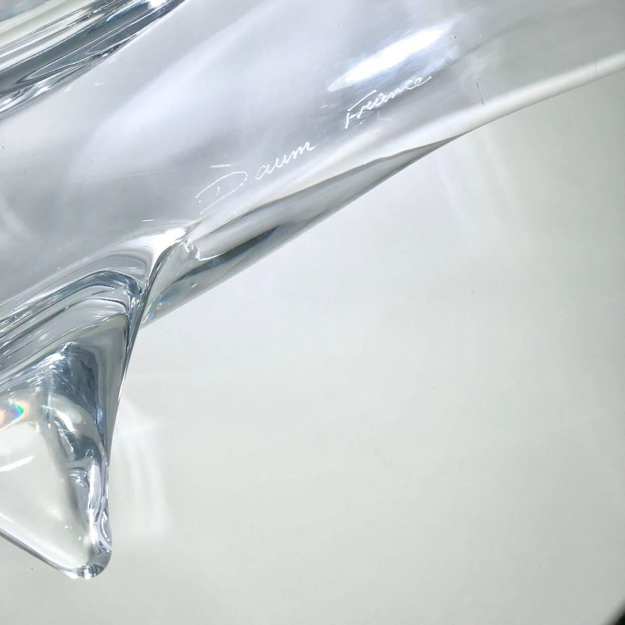 Daum crystal artwork creation is signed with 