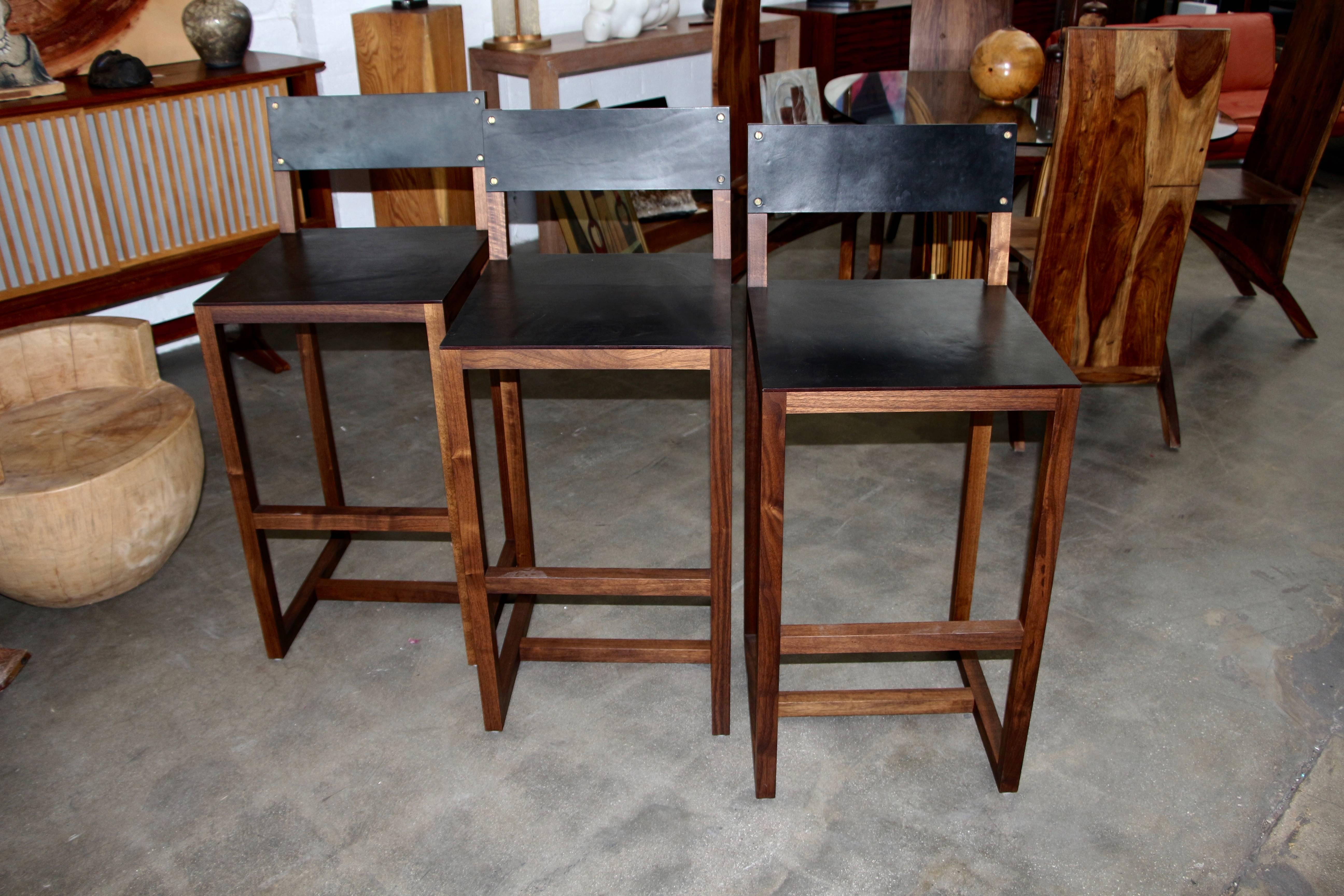 I believe these are out of the BDDW's Elgin line and they are very elegant gently used bar stools. These are from the early production of the company were purchased at least 10 years ago.

PLEASE TAKE A MOMENT TO VISIT OUR ART GALLERY ON 1STDIBS
