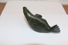 Two Eskimo or Inuit Carvings of a Walrus and a Seal