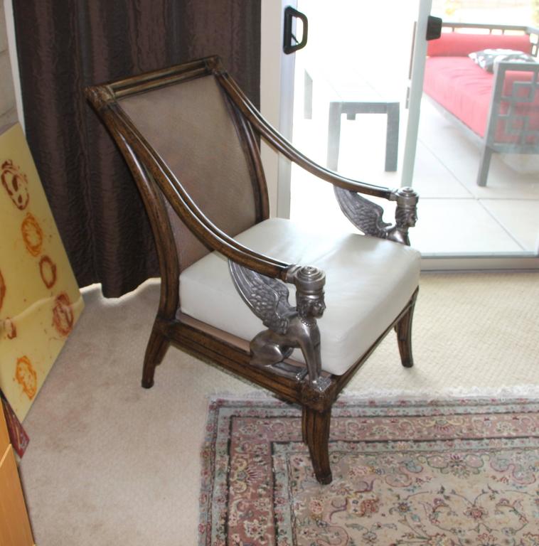 Egyptian Revival Cane and Leather Armchair with Sphinx Arms at 1stDibs