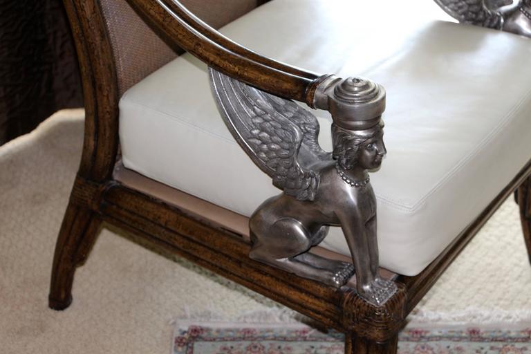 Egyptian Revival Cane and Leather Armchair with Sphinx Arms at 1stDibs