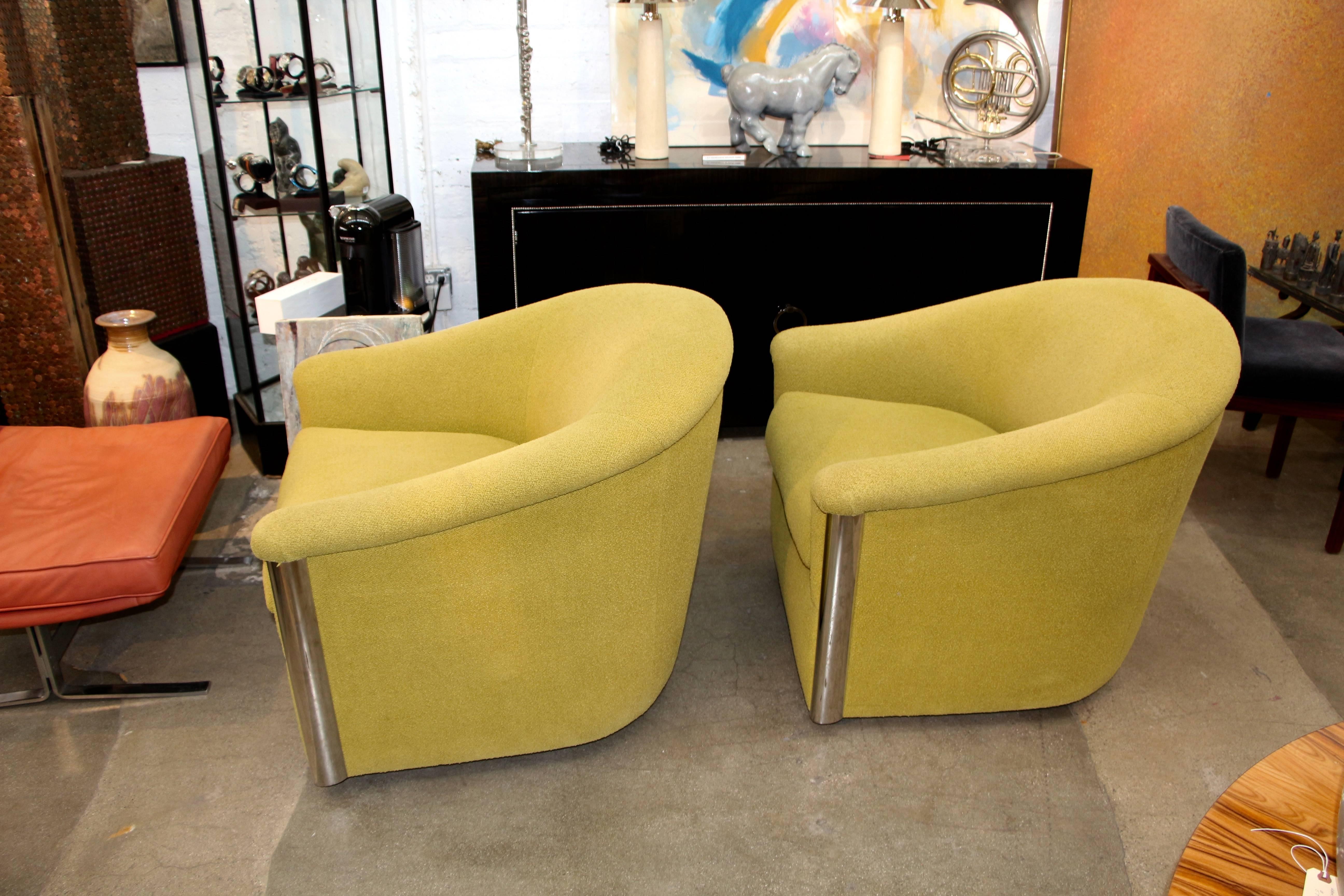 A pretty wonderful pair of chairs designed by Sally Sirkin Lewis for J. Robert Scott in a Chartreuse nubby fabric. The chairs are vice-versa chairs and so marked on the bottom. They swivel and each are on five castors. Great color, these chairs