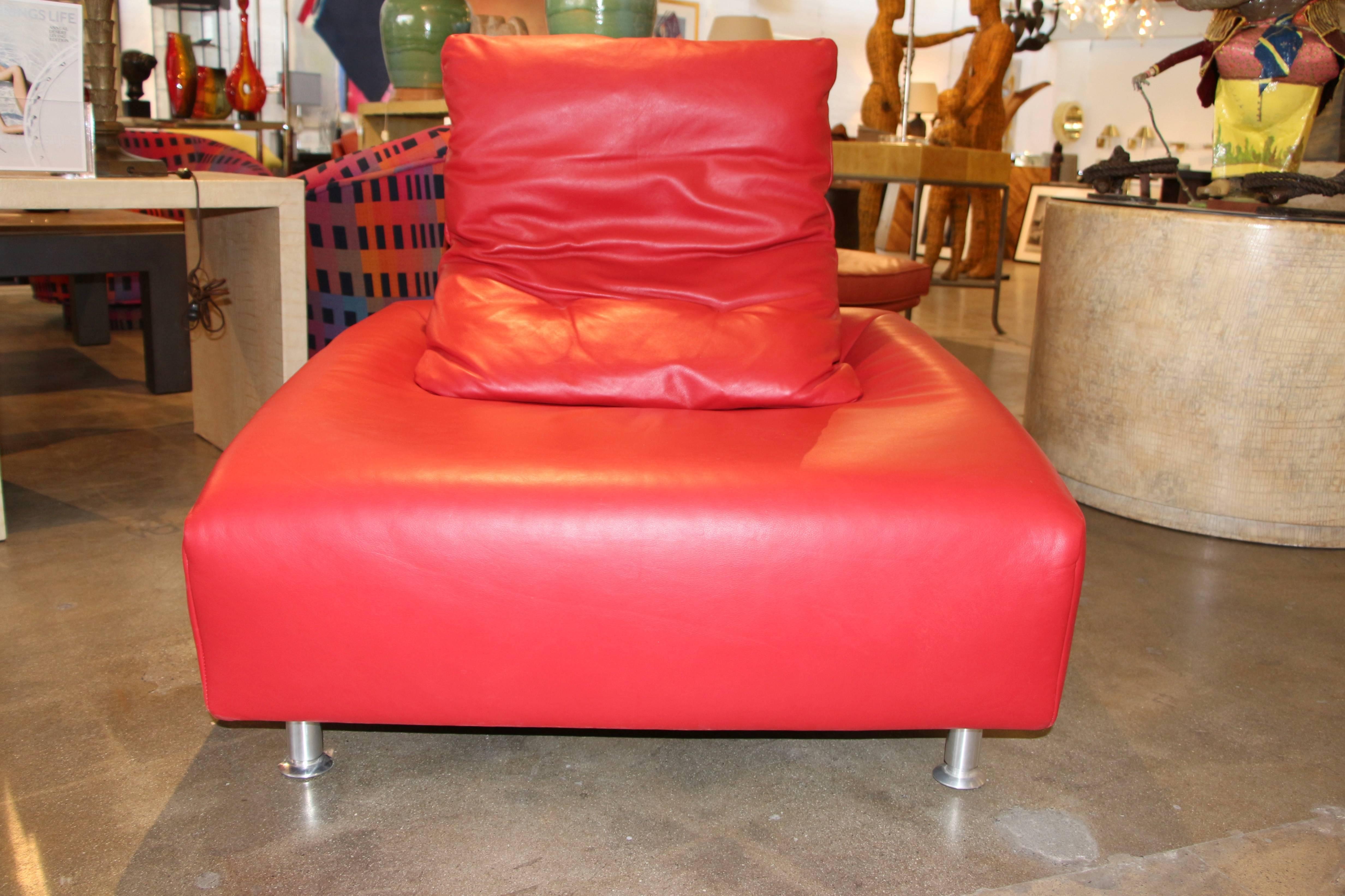 A really incredible red leather chair in great soft Italian leather. It is so well made the feet adjust to level the chair. From the same estate as the Giorgio Saporiti IL Form furniture we have listed. It may well be from the same firm. The chair