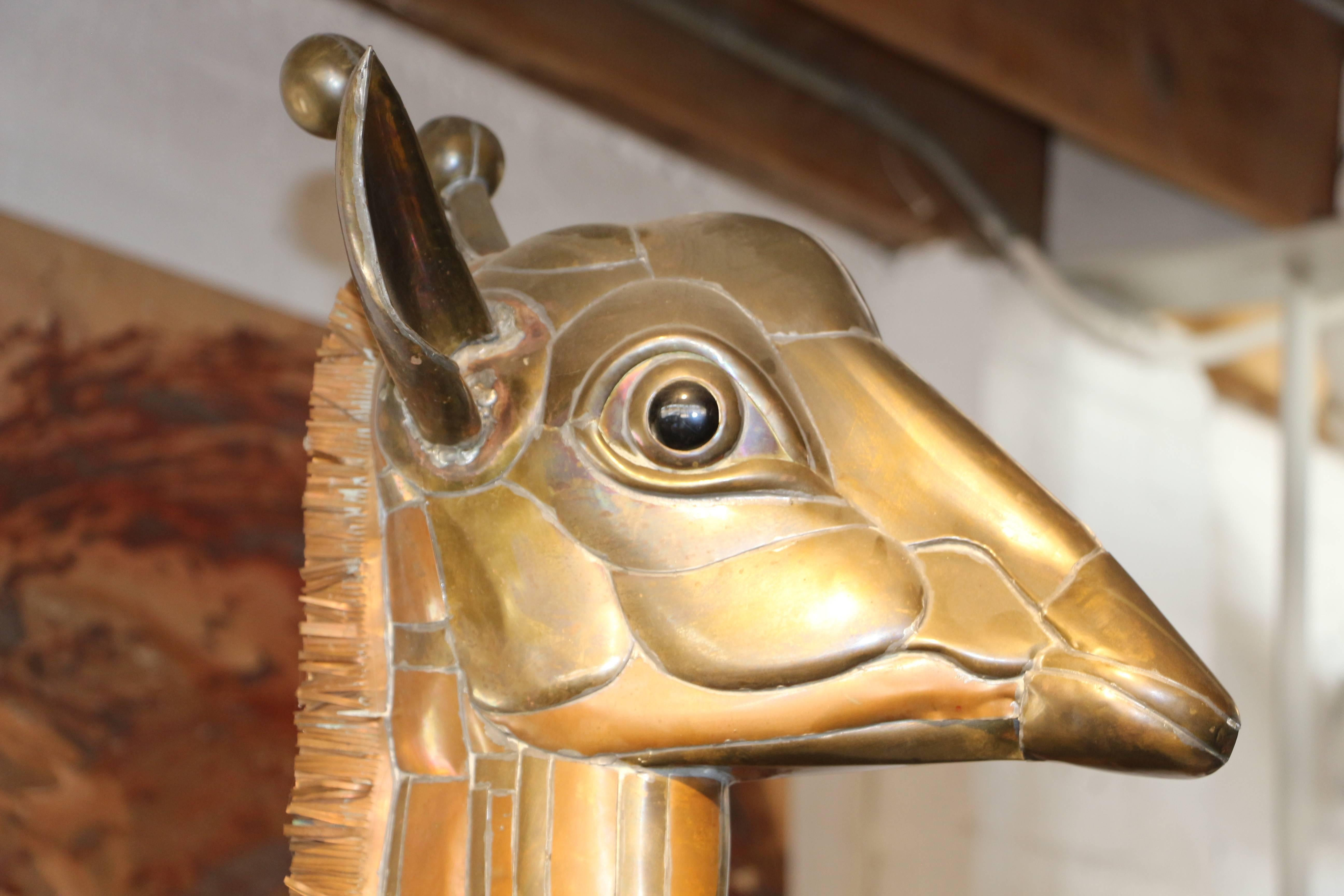 A very large wall-mounted Giraffe designed by Sergio Bustamante. We cannot find a signature but this is clearly by the Mexican master. It was purchased from one of the most prominent Palm Springs Estates, along with the bird we are also listing this