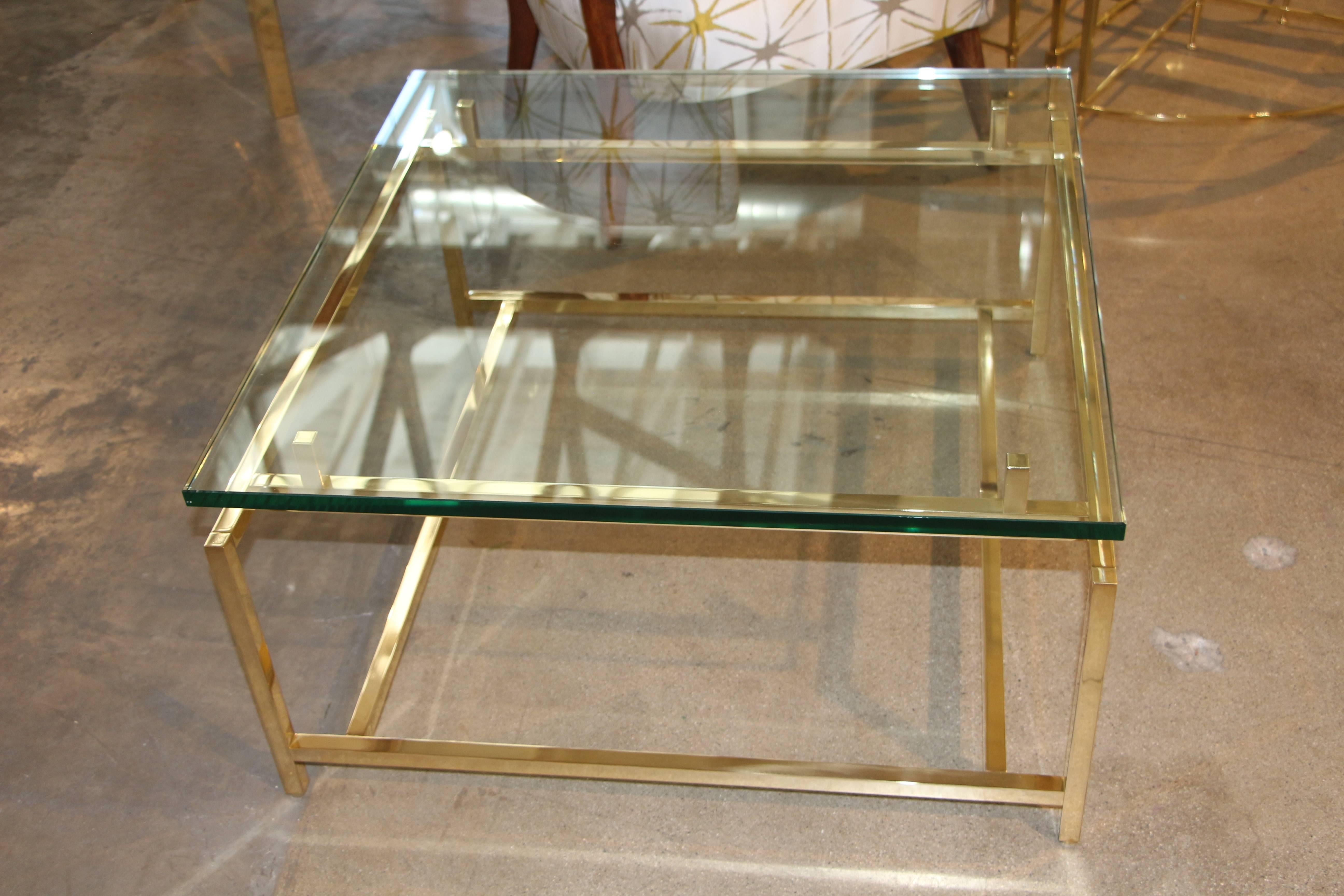 A quite lovely vintage brass cocktail table.
Well constructed with parts that screw together.