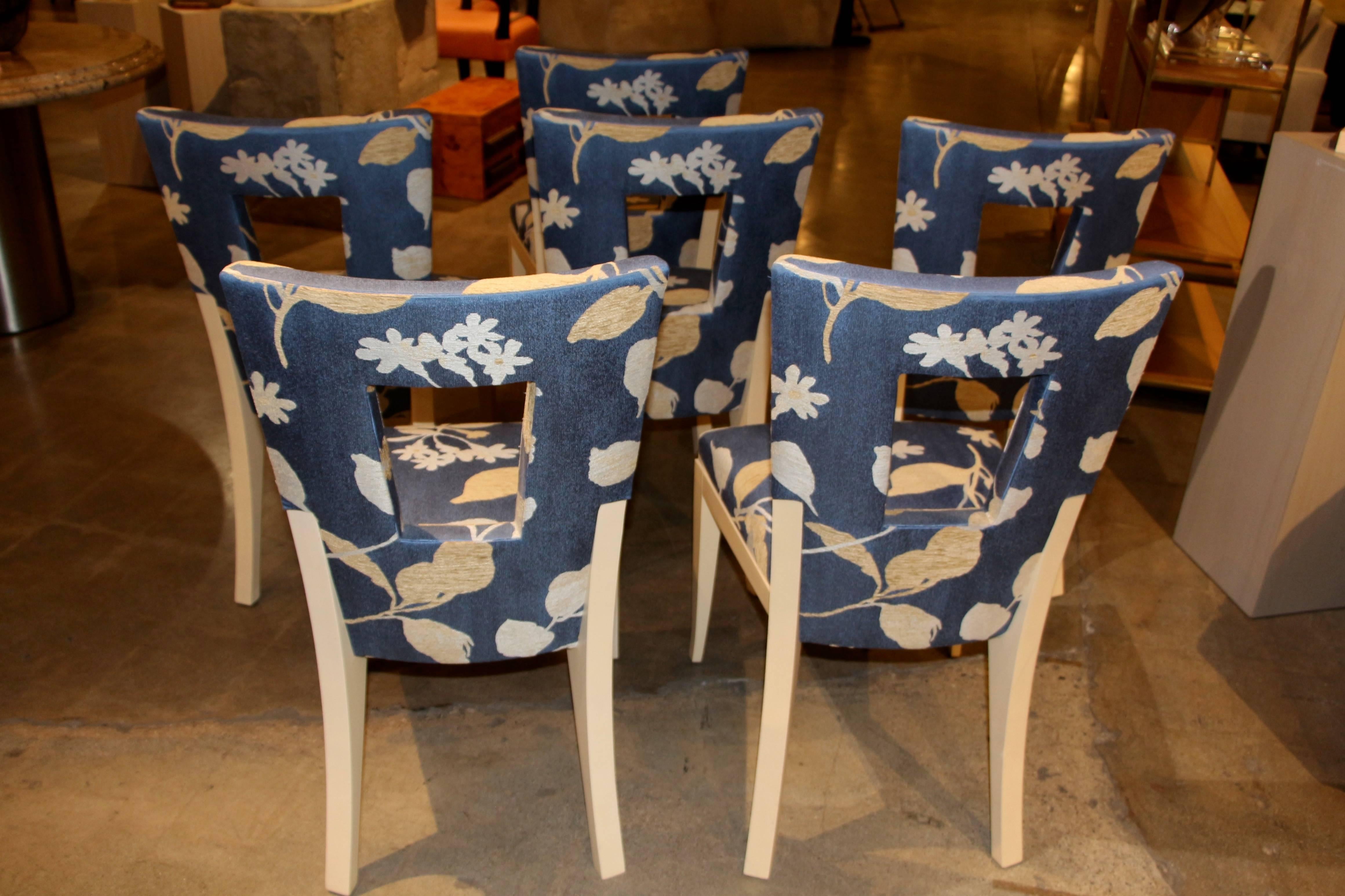 A beautiful set of six Dakota Jackson labelled dining or side chairs nicely upholstered in a silk Donghia floral fabric. If you look at the pattern all of the chairs have the floral pattern in the same position on each chair. These chairs are in