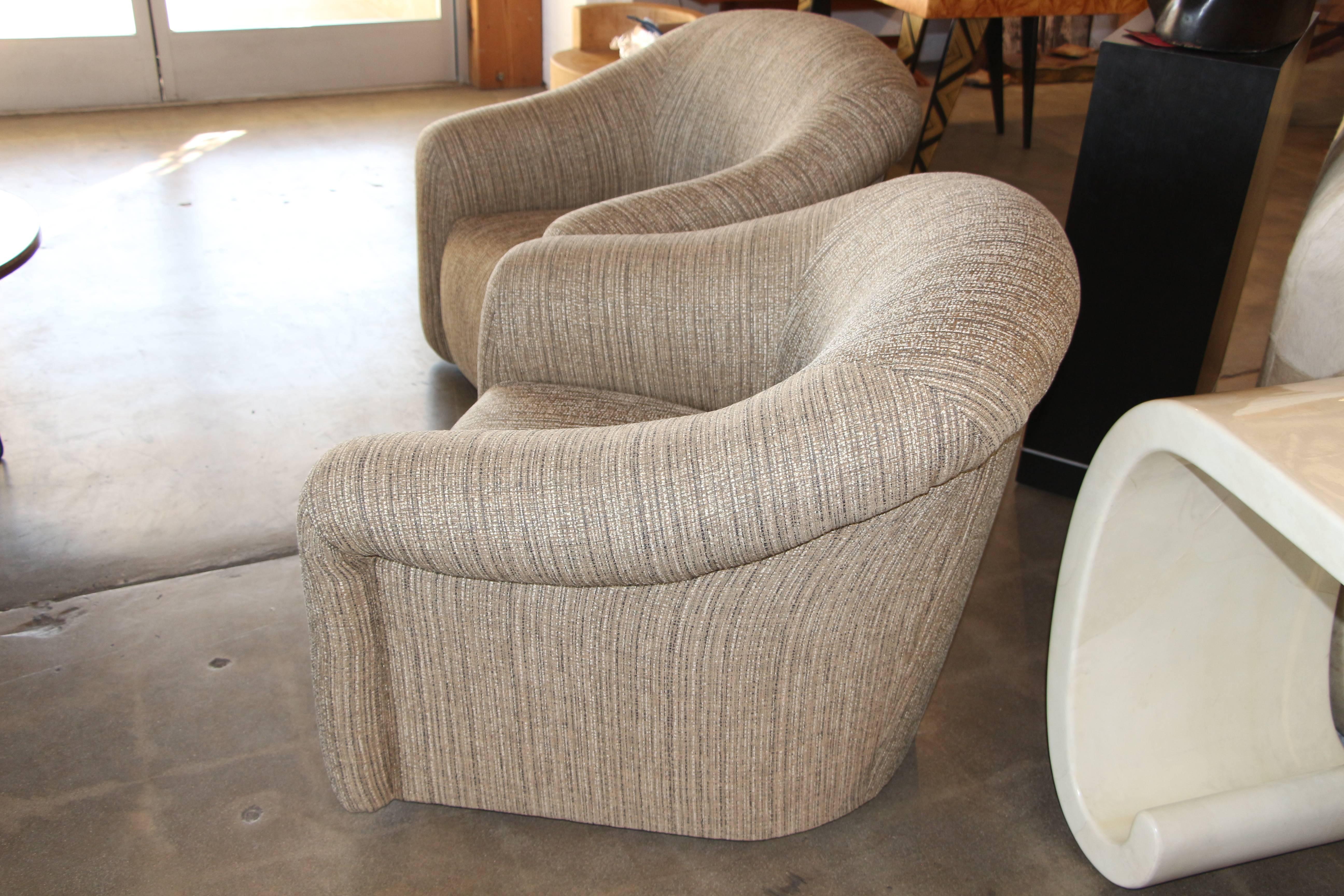 Pair of Comfortable Swivel A. Rudin Chairs and matching ottomans In Good Condition In Palm Springs, CA