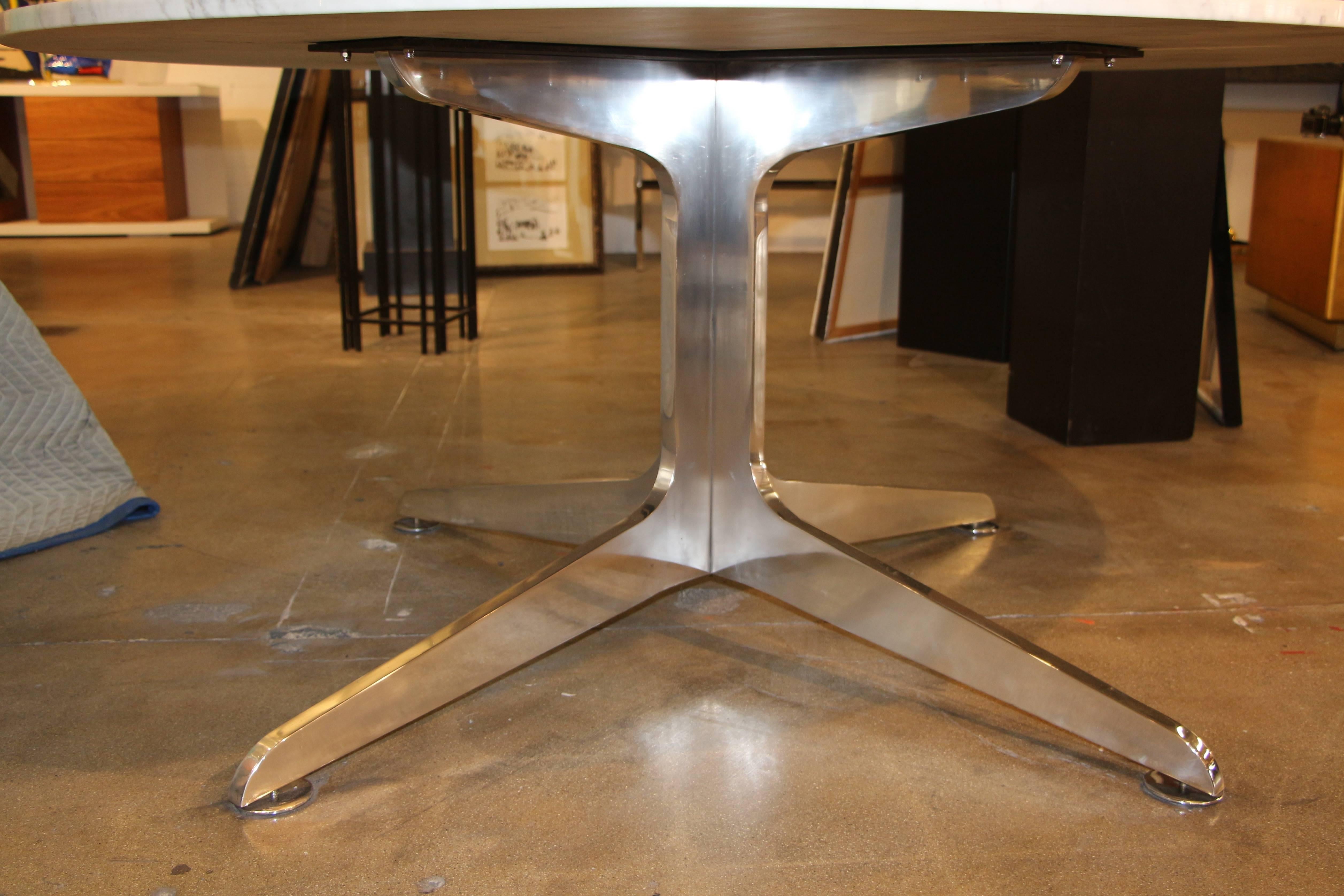 One of the more unusual pieces we have had the pleasure of coming across is this  solid aluminum table base. It has steel disc feet that help level the table as they screw in or out. The aluminum stock is 1 inch thick and solid. The welding work is