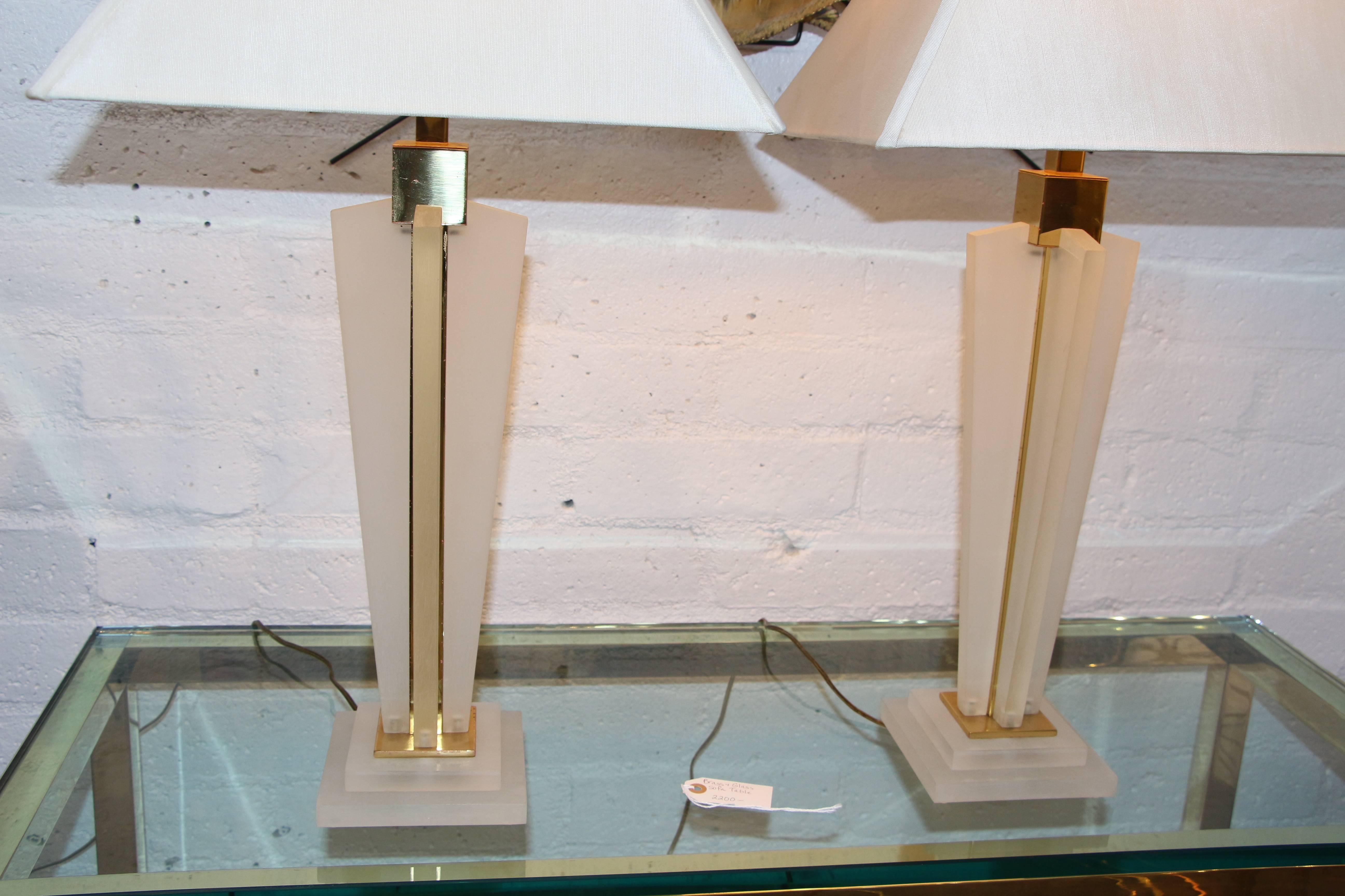 A nice pair of frosted Lucite and brass lamps by Frederick Cooper of Chicago.
These lamps come with the shades pictured. They are in working order. In good age appropriate condition, with some minor marks and imperfections.