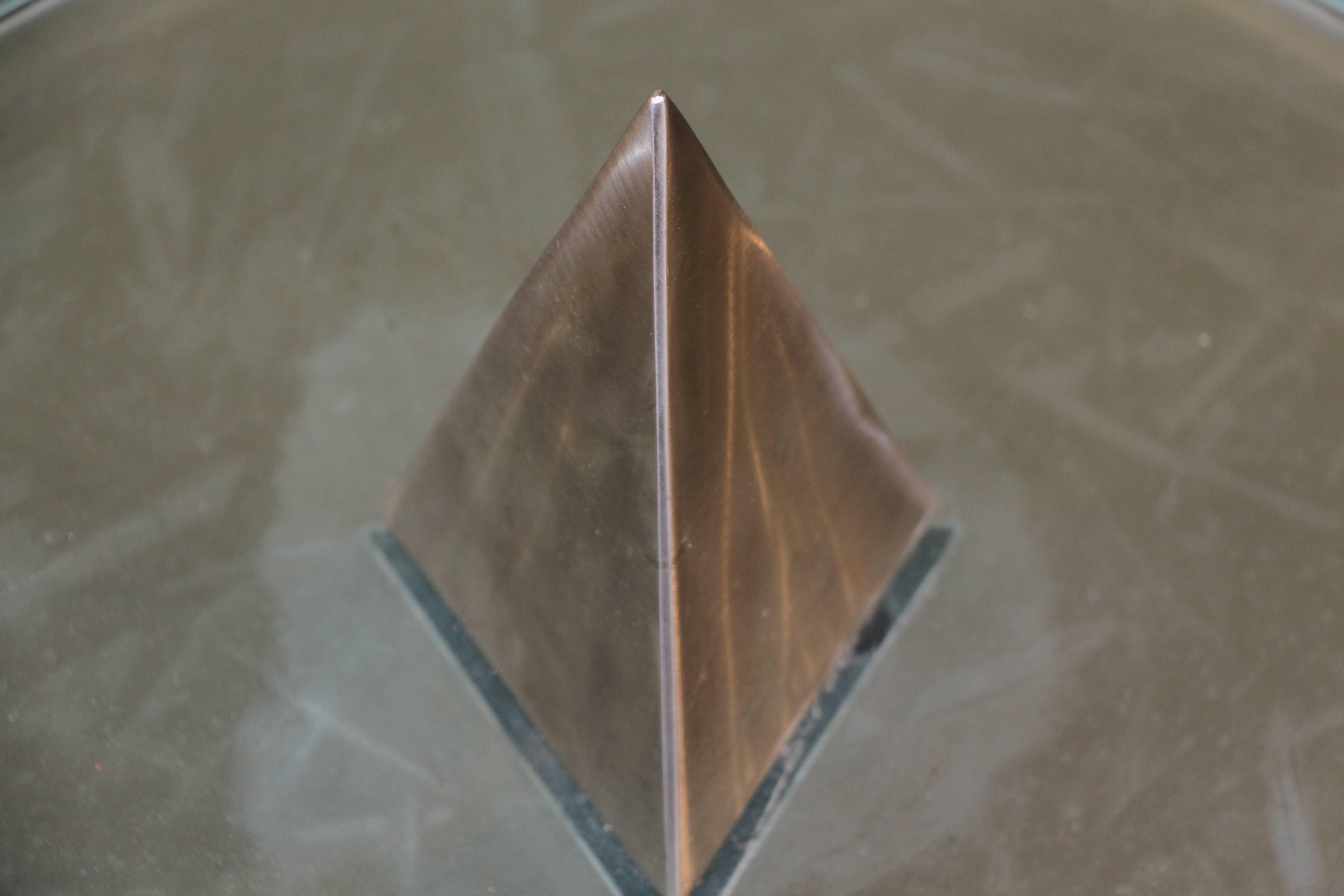 A most unusual table sculpture that is lightly unique and lights up, please see the detailed image of it lit. The triangle is slightly off, indicating it must have been put together by hand. The frosted glass is smooth on the top and etched lightly