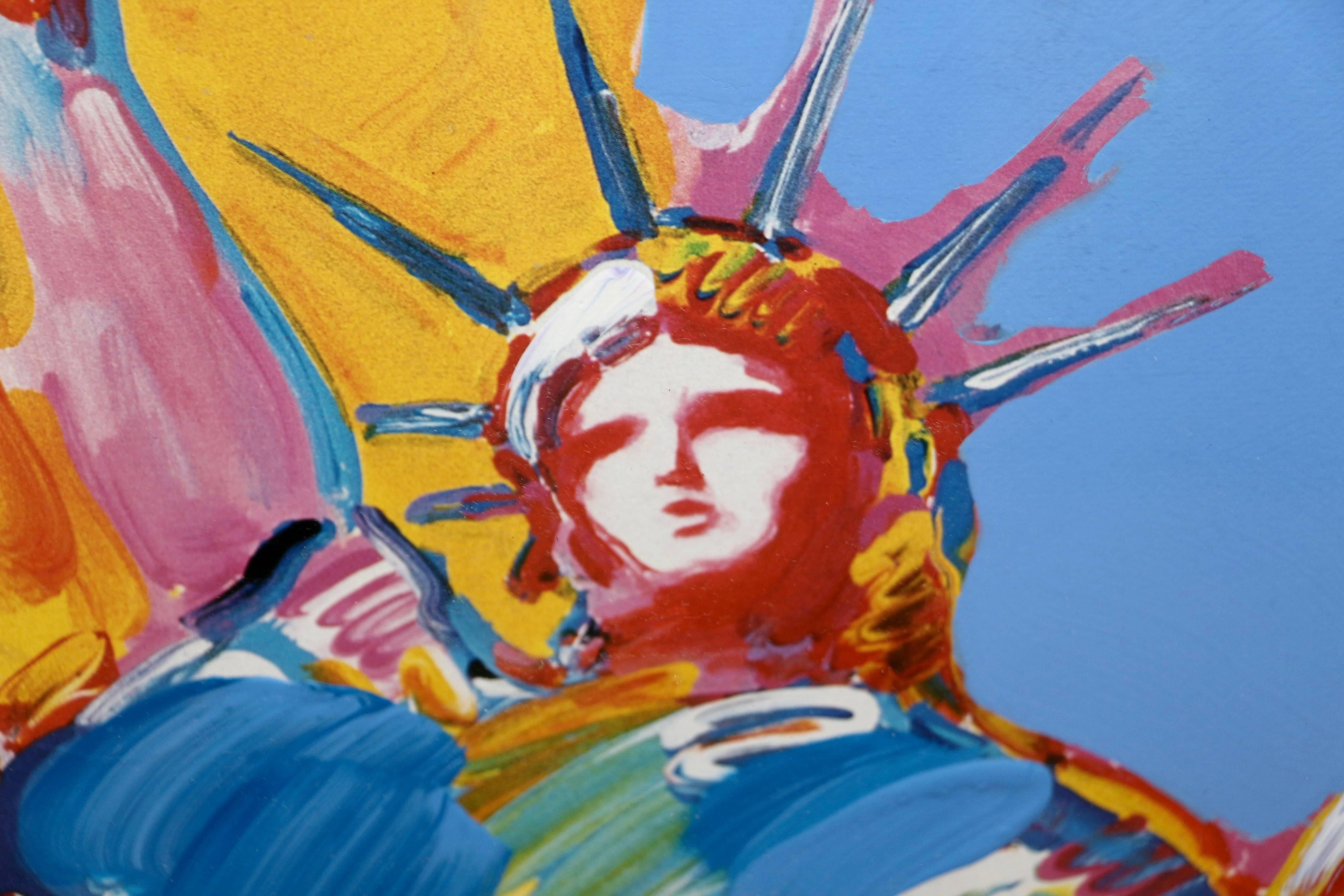 A unique work of art by Peter Max out of his Statue of Liberty series from 2001. This is a Mixed Media with Acrylic painting and color lithography on paper. It is signed upper right in acrylic. Beautifully framed. The black mesh back has some dust
