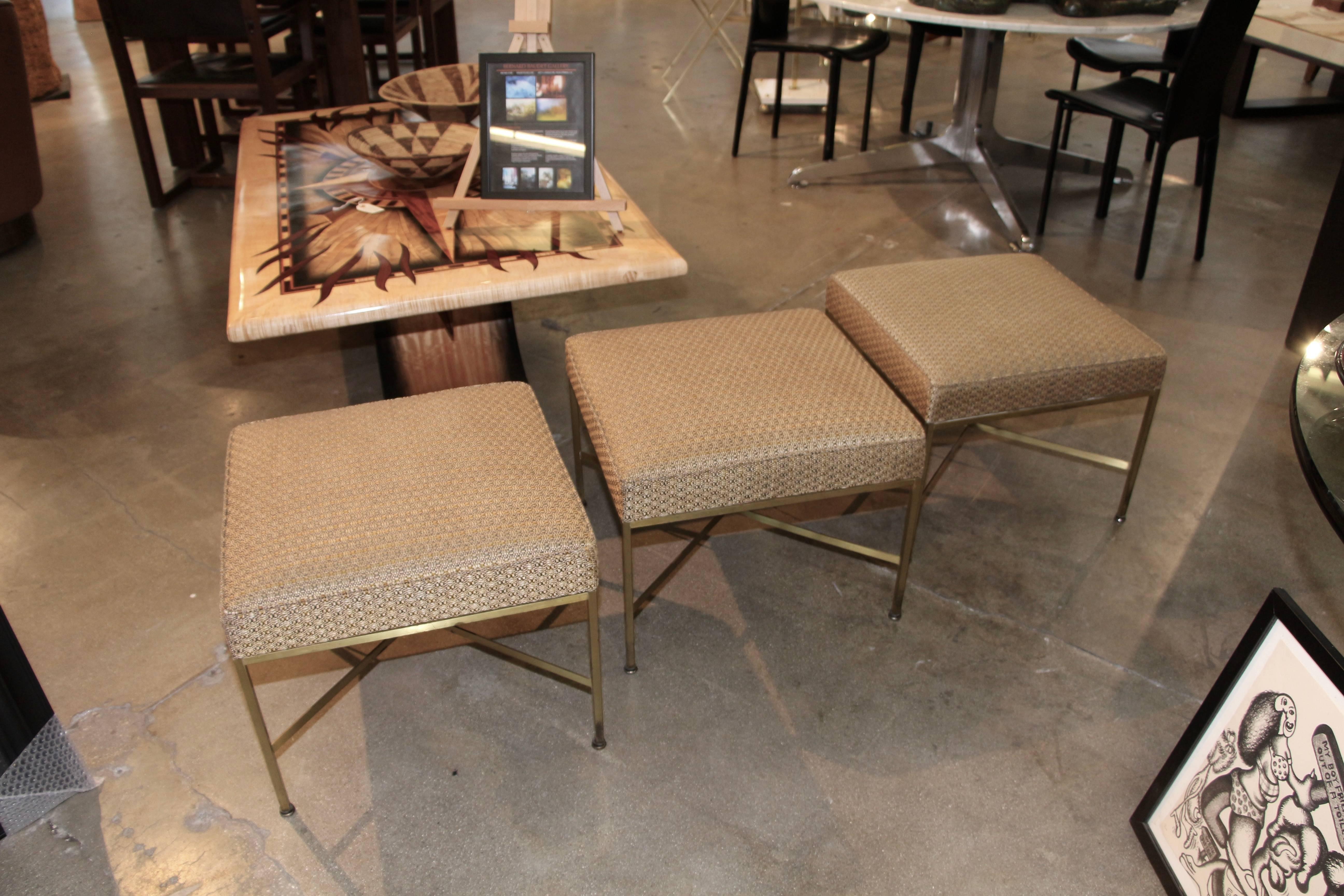 A really special find indeed is this set of three Paul McCobb ottomans from the 1950s designed for Directional. We believe this to be the original fabric and cushions. They are in good condition considering their age. The cushions are still useable